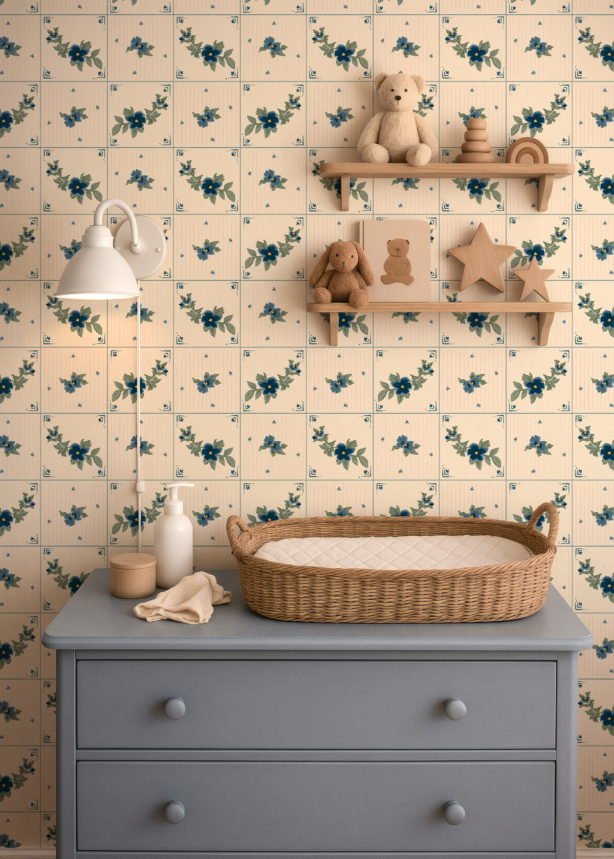 Azulejo floral tile wallpaper in baby nursery with blue flowers, warm cream background and natural wood decor