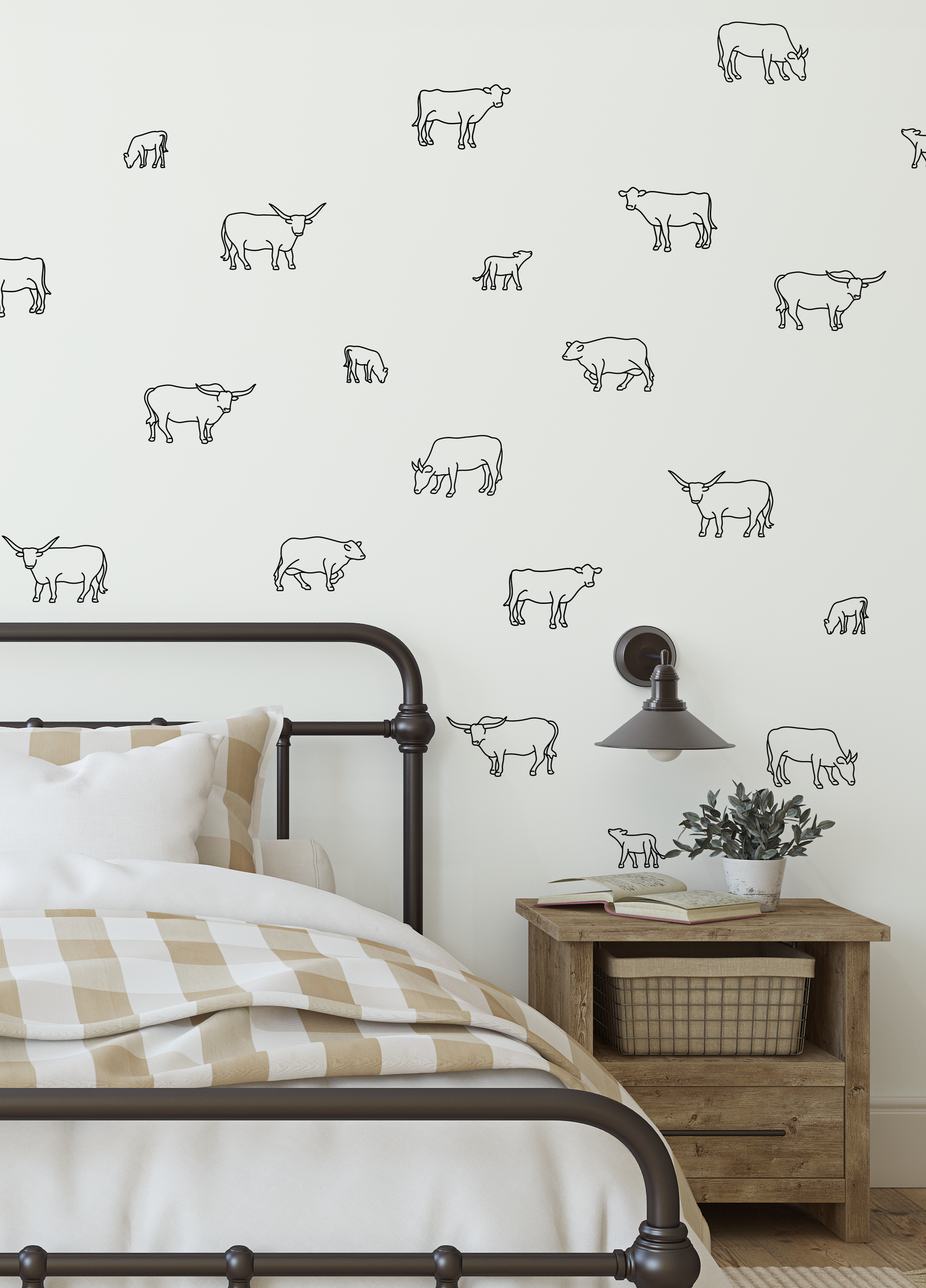 Black outline cow decals on white wall in rustic bedroom with checkered bedding