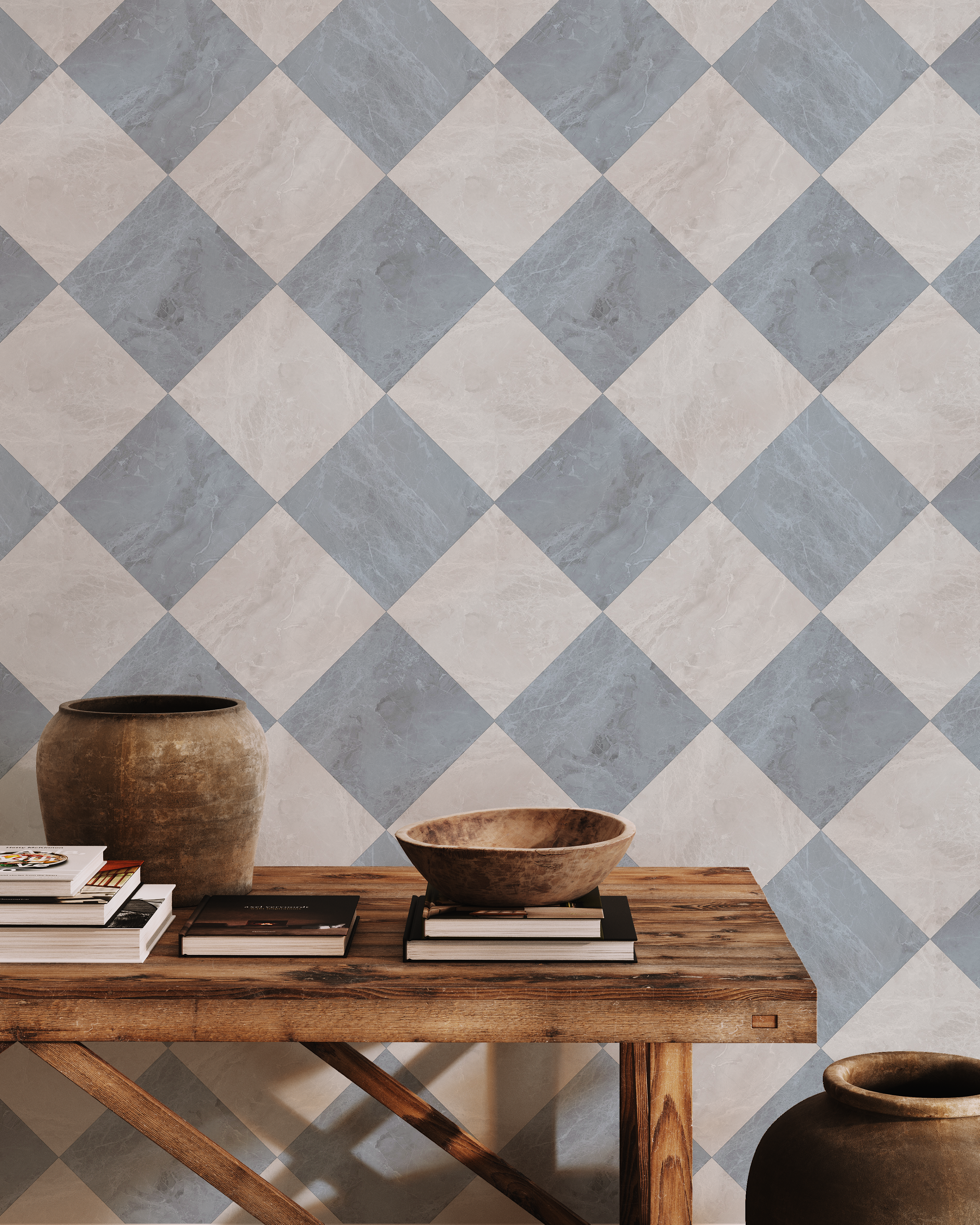 Blue and ivory harlequin tile wallpaper with marble texture styled behind a rustic wood console table
