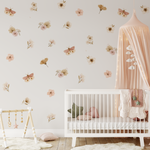 Bohemian butterfly and floral wall stickers in a soft pink nursery decor