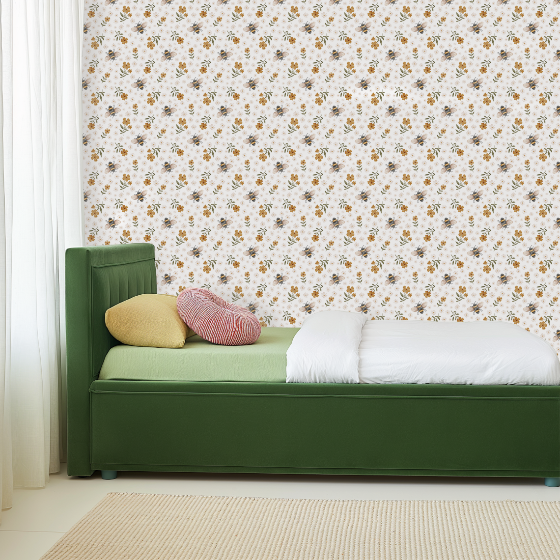 Busy bee wallpaper in a bedroom with green upholstered bed, mustard floral accents, and whimsical botanical wall pattern