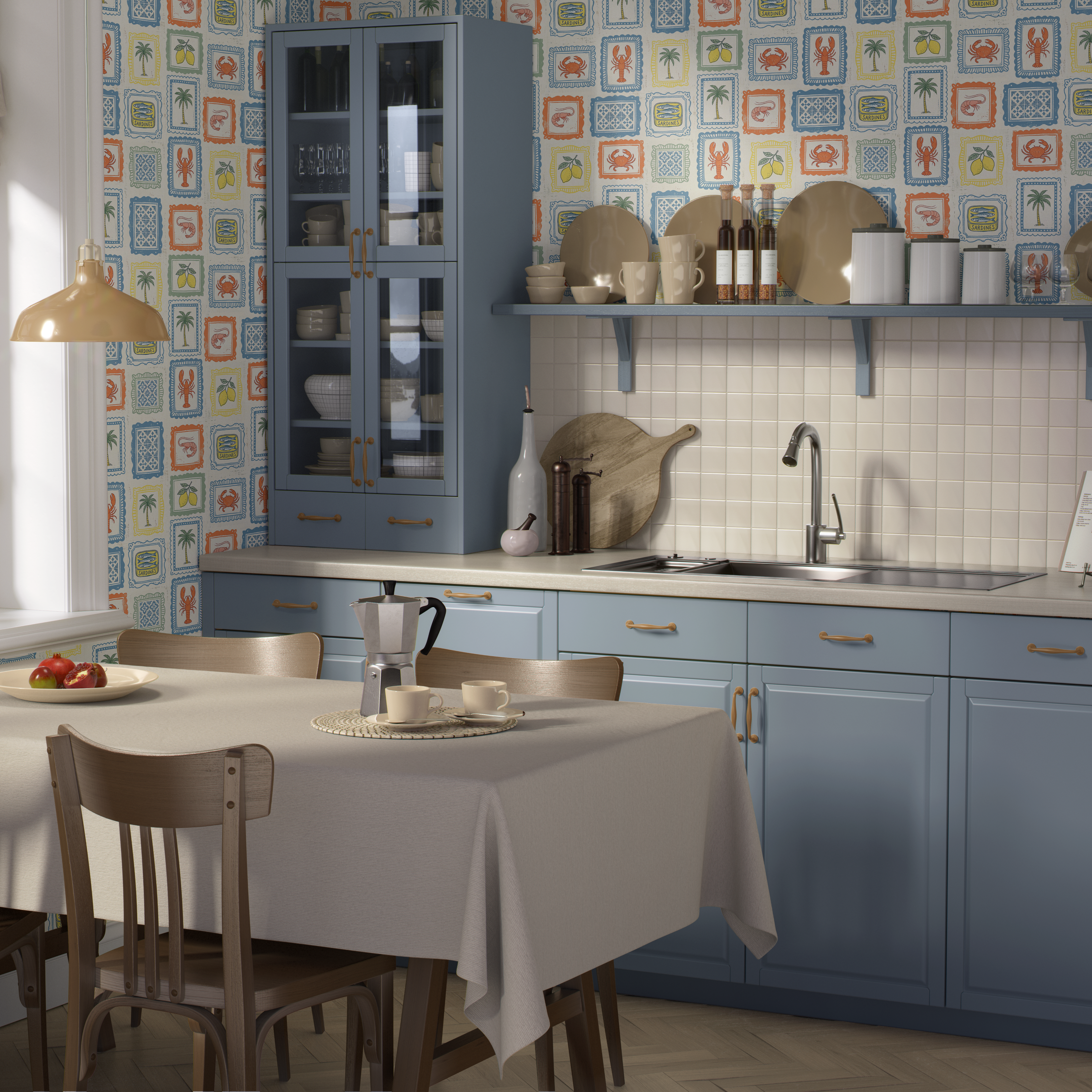 Modern kitchen with blue cabinets, colorful coastal Mediterranean wallpaper, and a dining table.