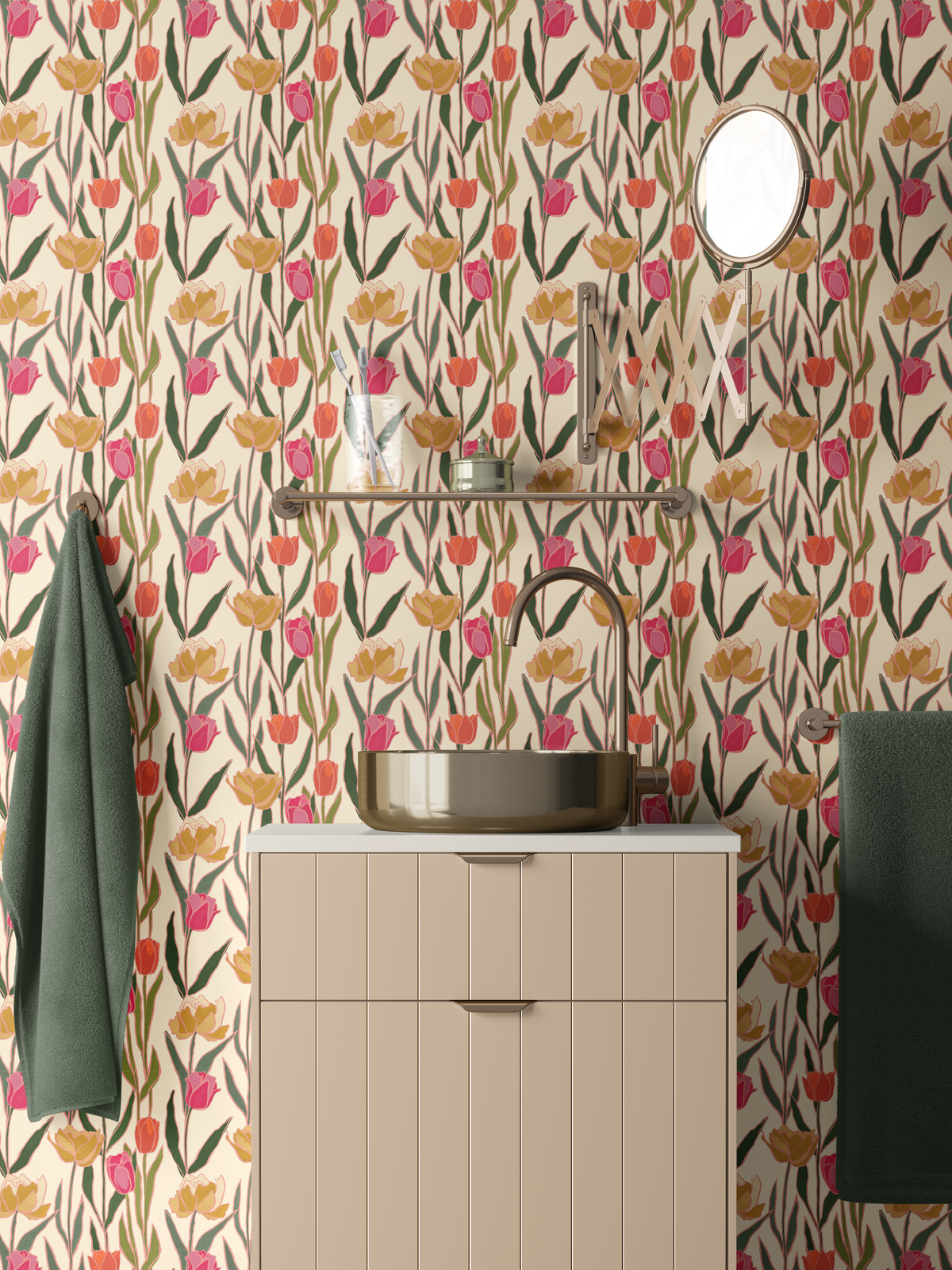 Bright floral tulip wallpaper in a bathroom with cream vanity, brass fixtures and dark green towels