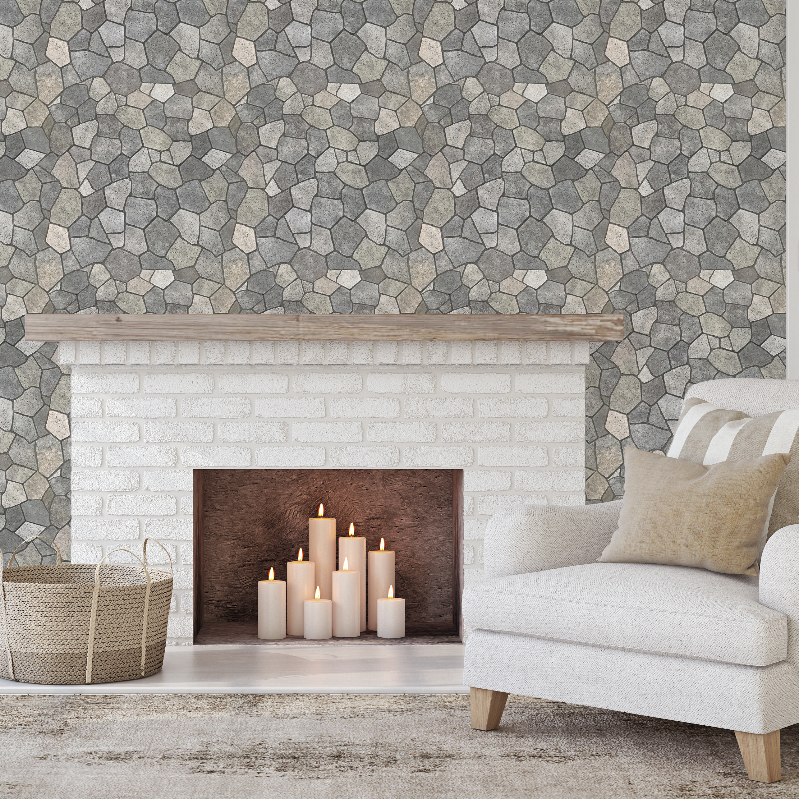 Flagstone tile wallpaper in a cozy living room with white brick fireplace and candles