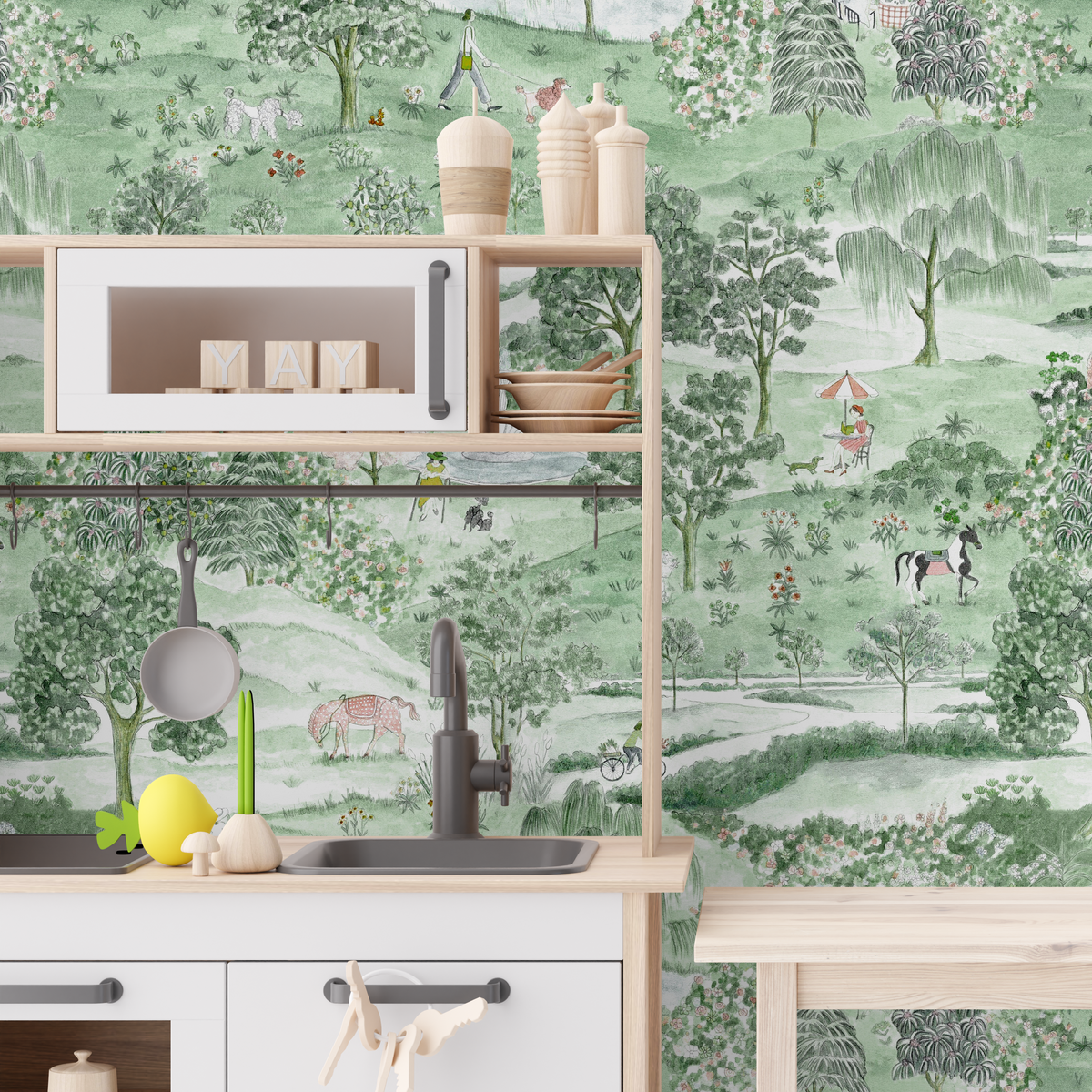 English countryside wallpaper in a kids playroom featuring green trees, flowers, horses and whimsical garden illustrations