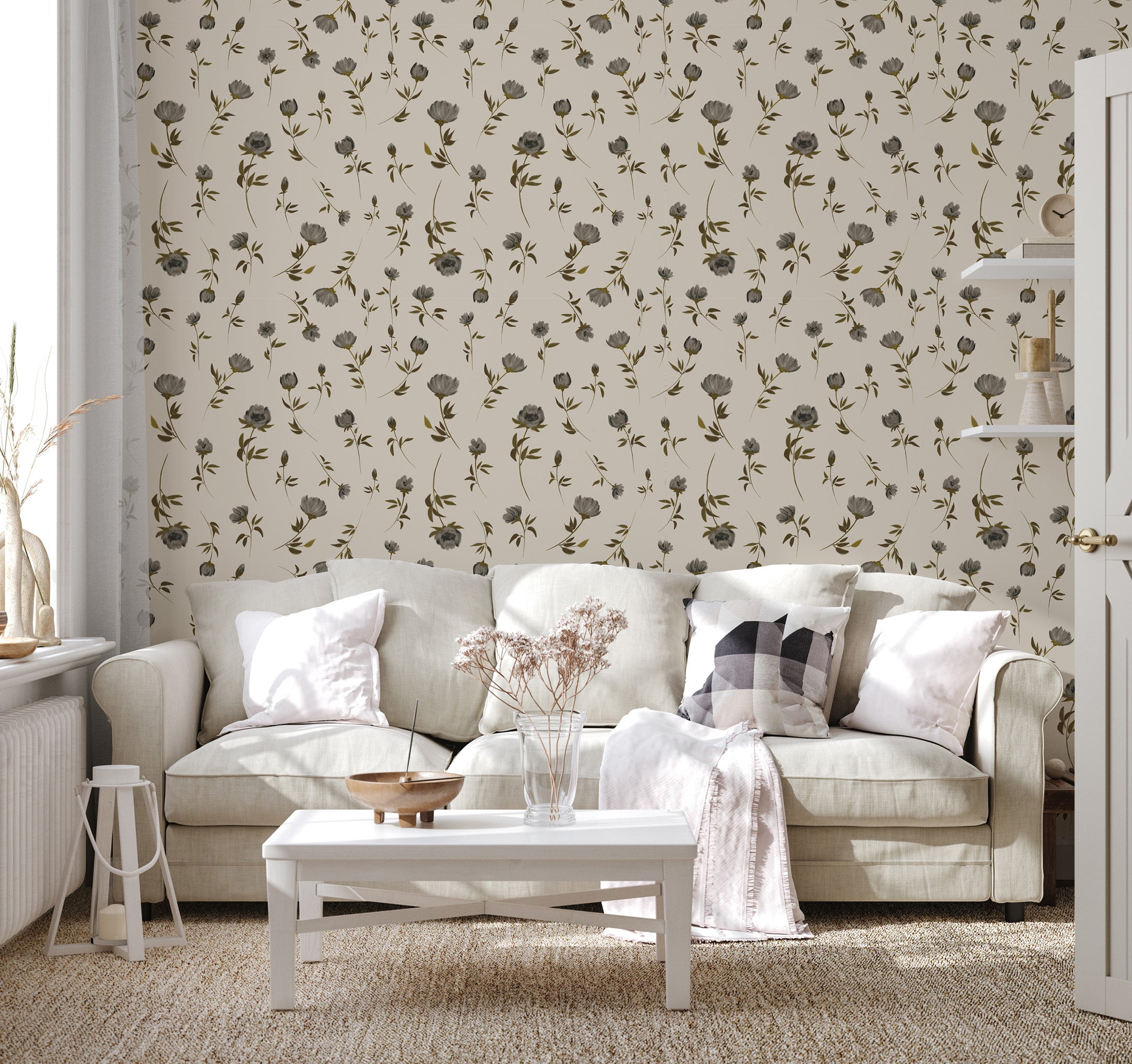 Neutral floral wallpaper styled in a cozy living room with light sofa and natural textures