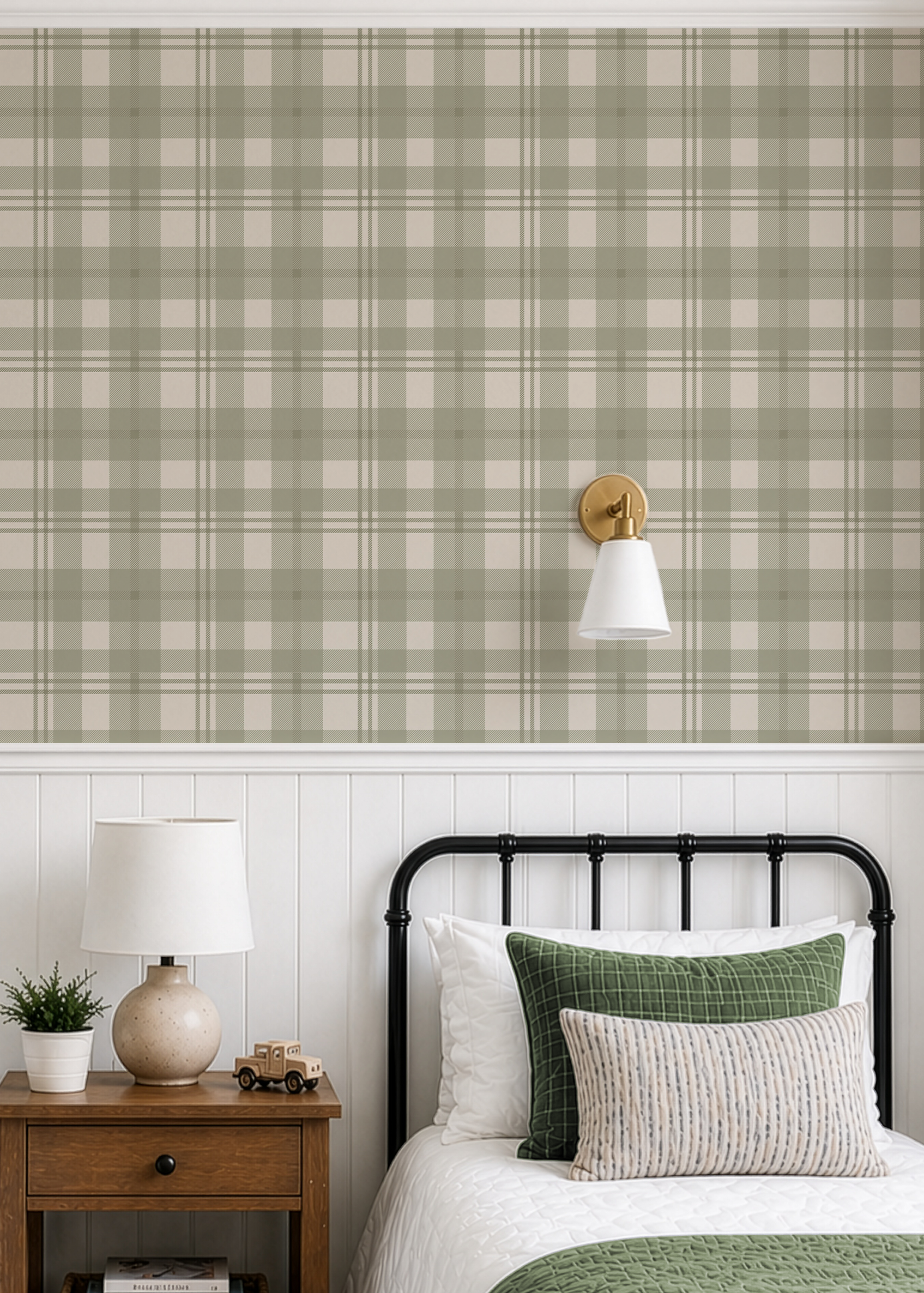 Green and cream plaid wallpaper in a traditional bathroom with white vanity and brass wall sconce