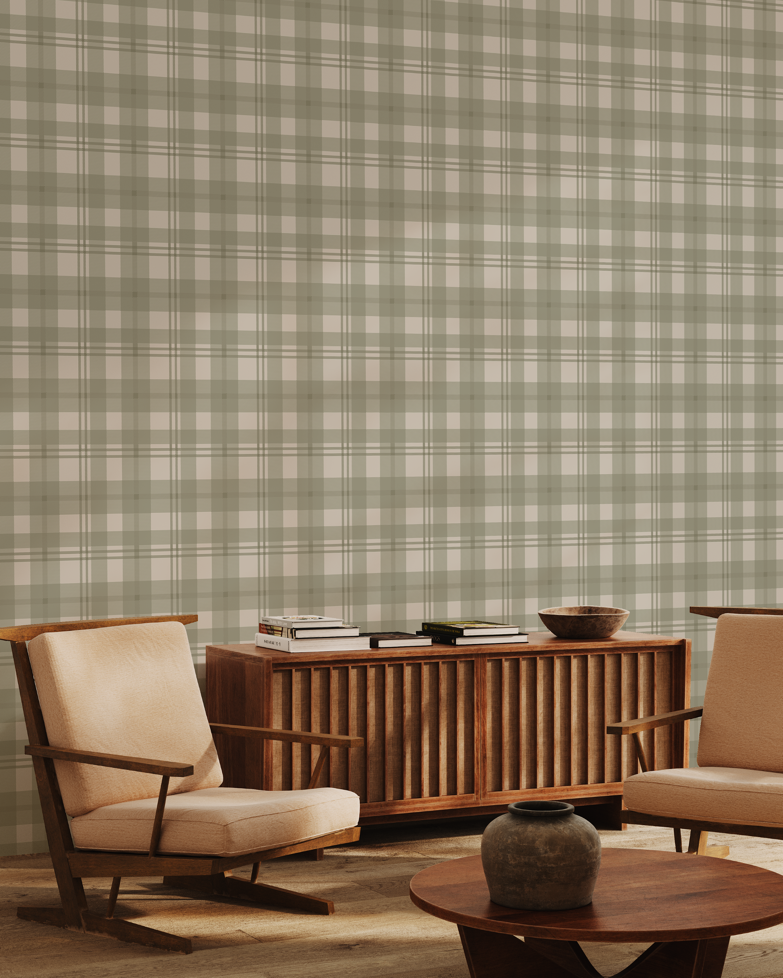 A styled interior scene featuring a large wall covered in a muted sage green and cream plaid wallpaper, with two mid-century modern armchairs, a wooden sideboard, and a round coffee table in the foreground.
