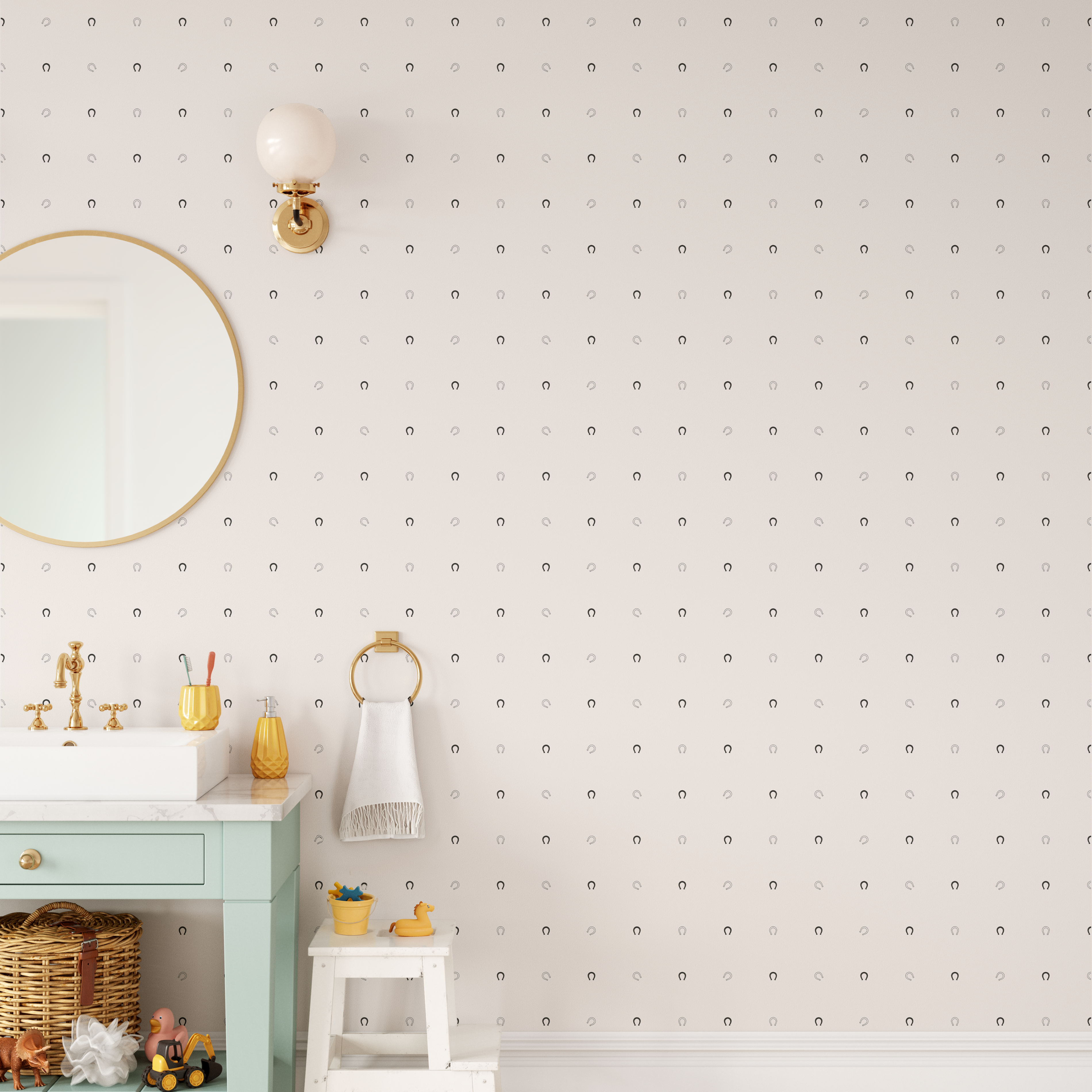 tiny horseshoe wallpaper in neutral bathroom with soft cream walls and gold fixtures