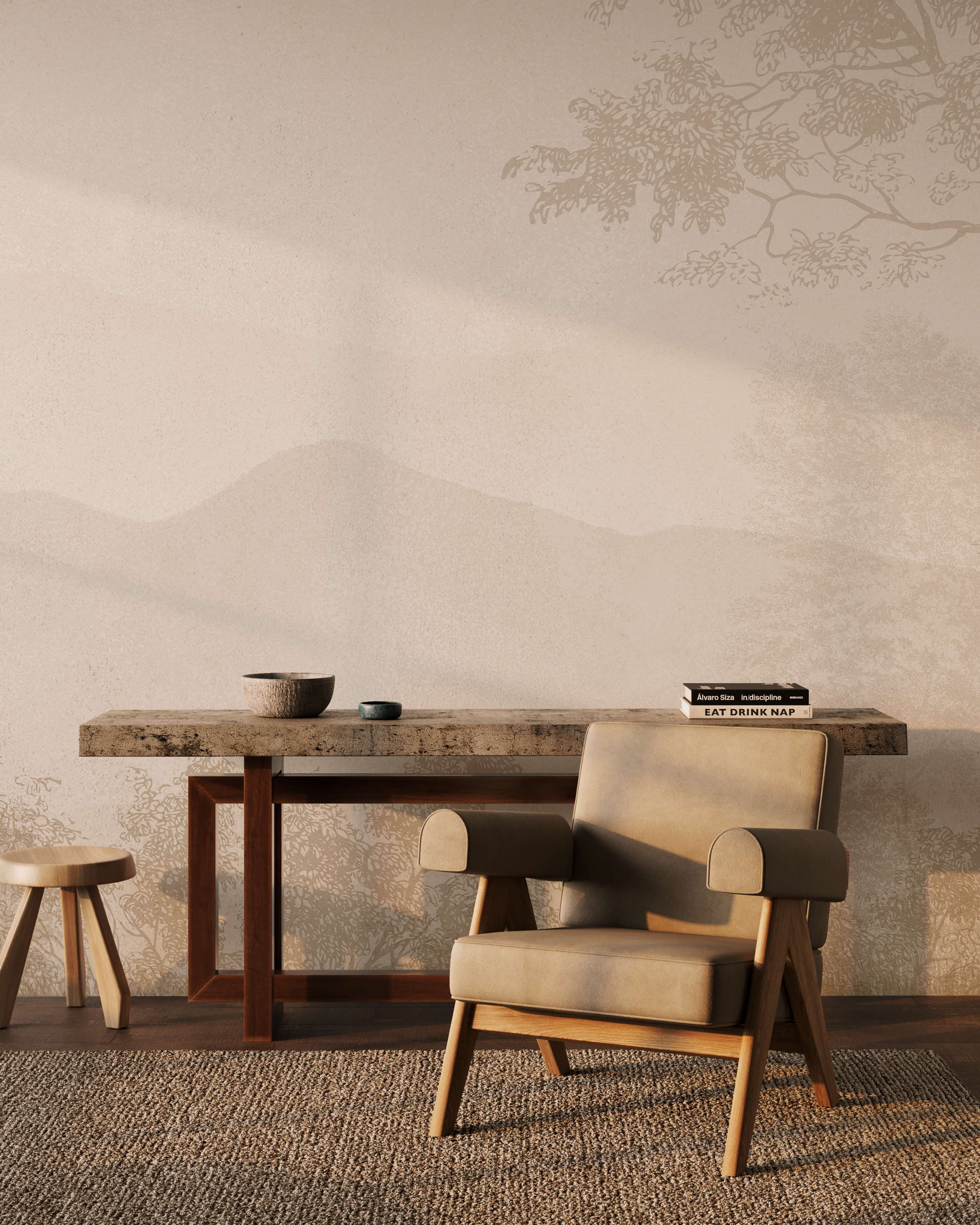 A styled interior scene with a beige upholstered armchair in the foreground, a rustic wooden table with bowls and books, and a textured wall with a faint mountain and tree mural. No people or animals are present.
