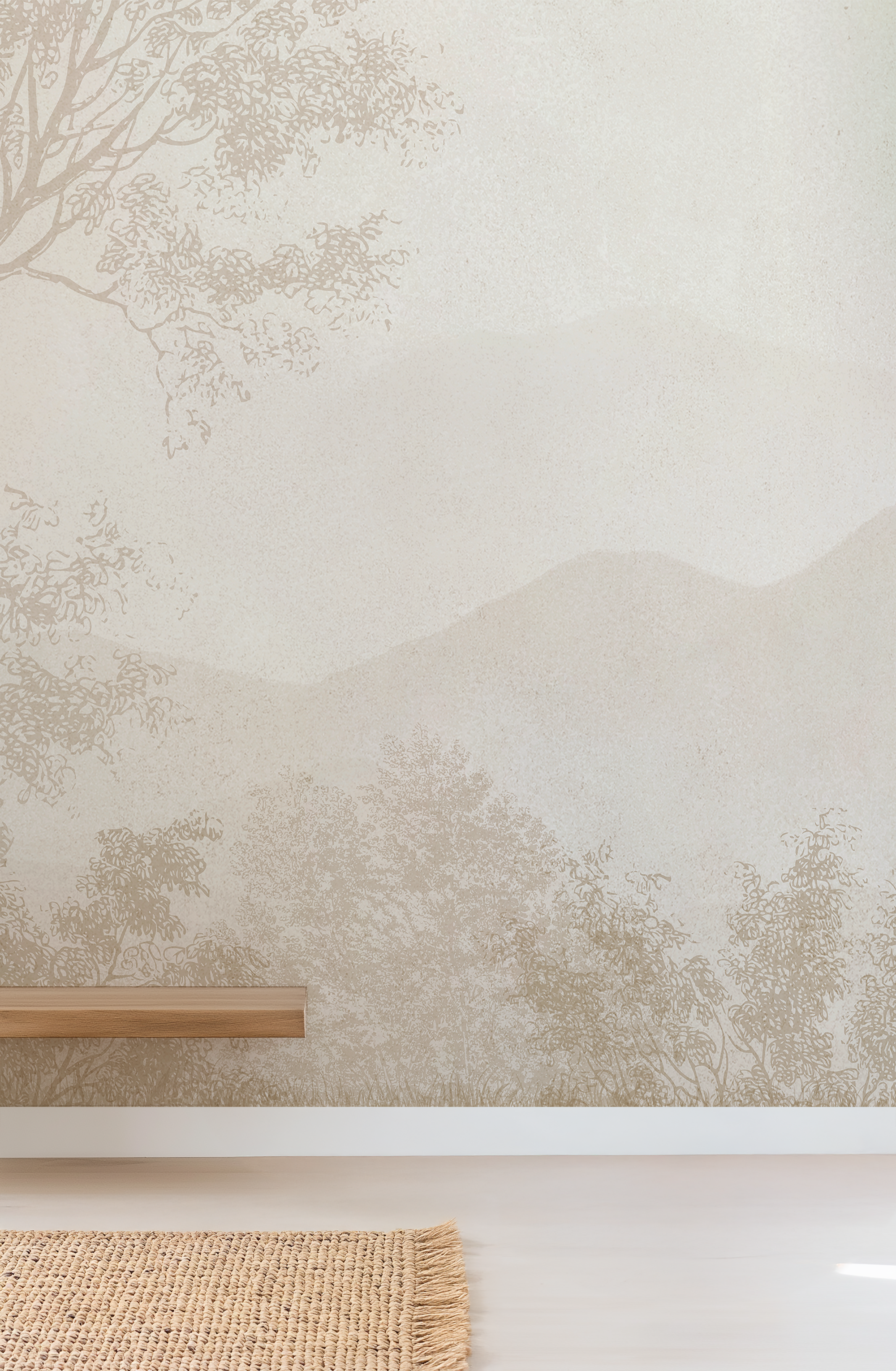 Beige wall mural with a subtle landscape design featuring trees, mountains, and misty hills, shown in a styled interior setting with a light wood floating shelf and a woven rug.