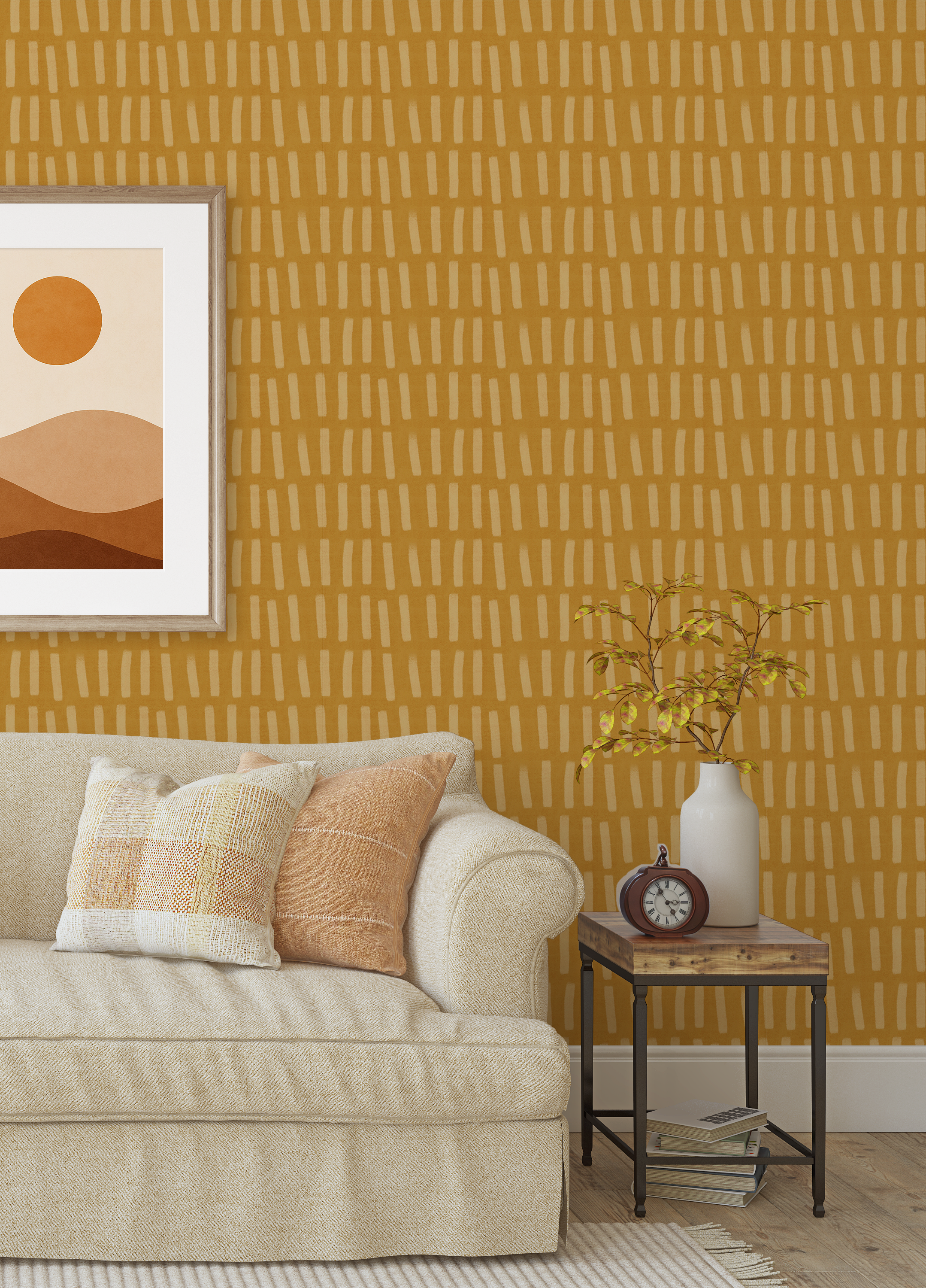 Mustard stripe wallpaper behind a beige sofa with earthy pillows and framed artwork in a cozy living room
