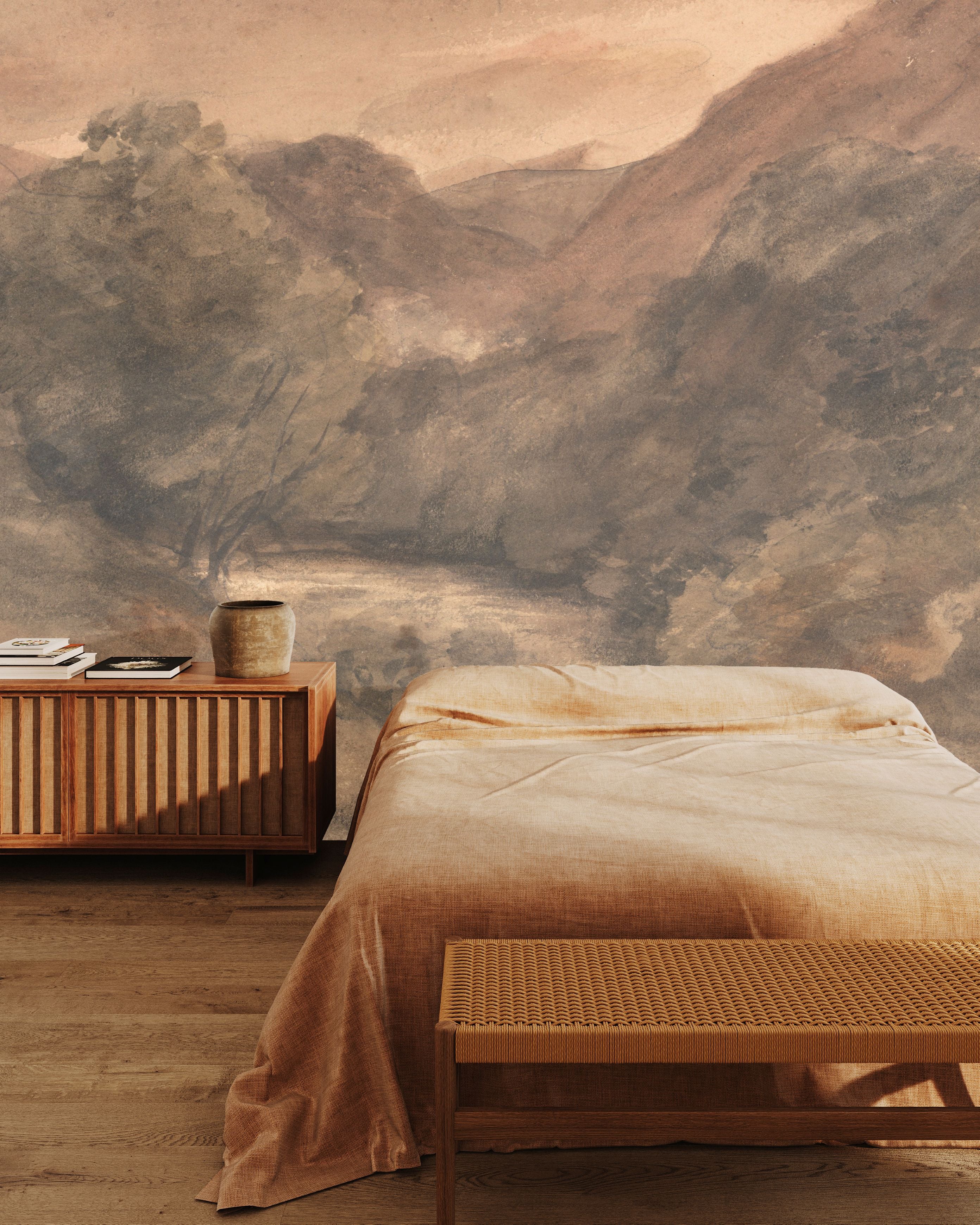 Painted mural wallpaper in earthy brown tones styled in cozy bedroom