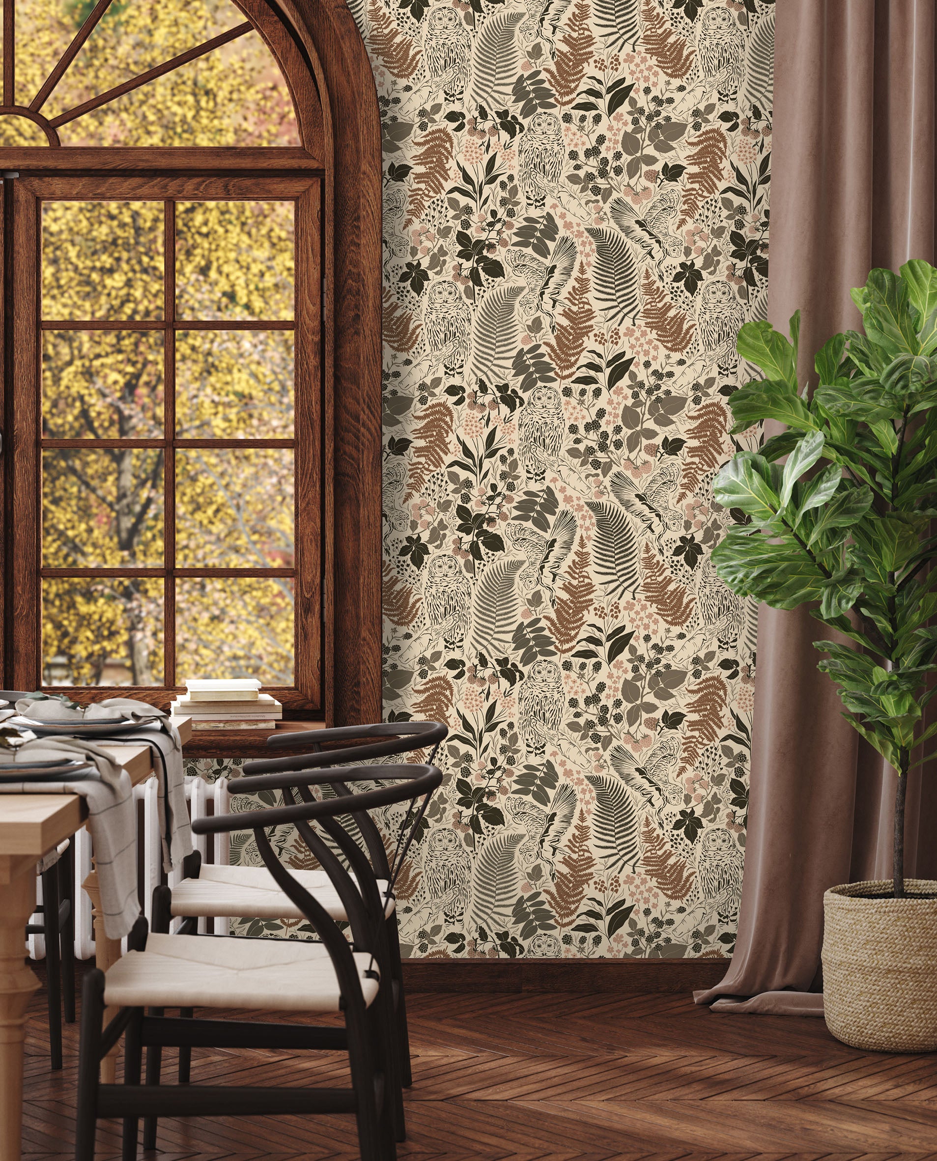Vintage-inspired owl and botanical wallpaper in a dining space with warm earthy tones
