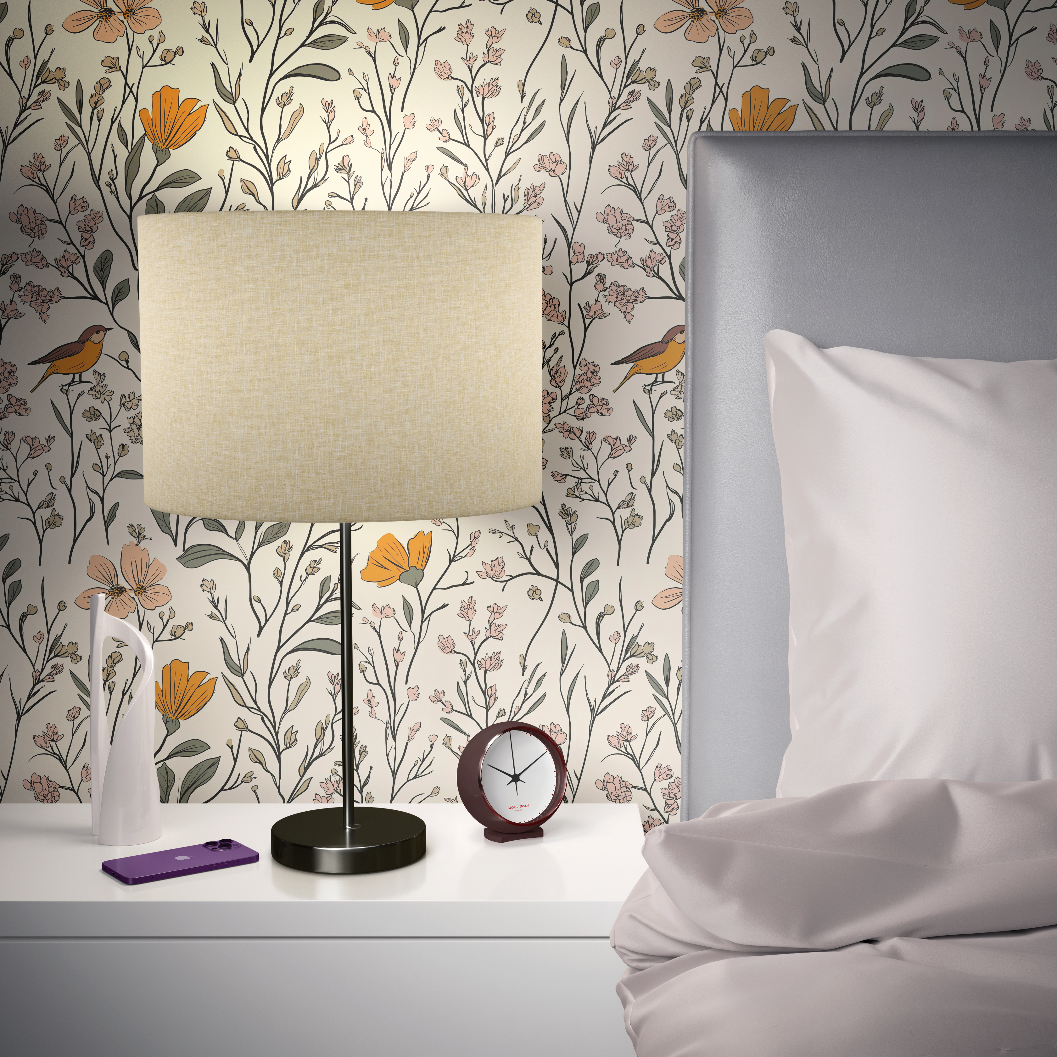 Nightstand with lamp and clock in front of Songbird Meadow wallpaper