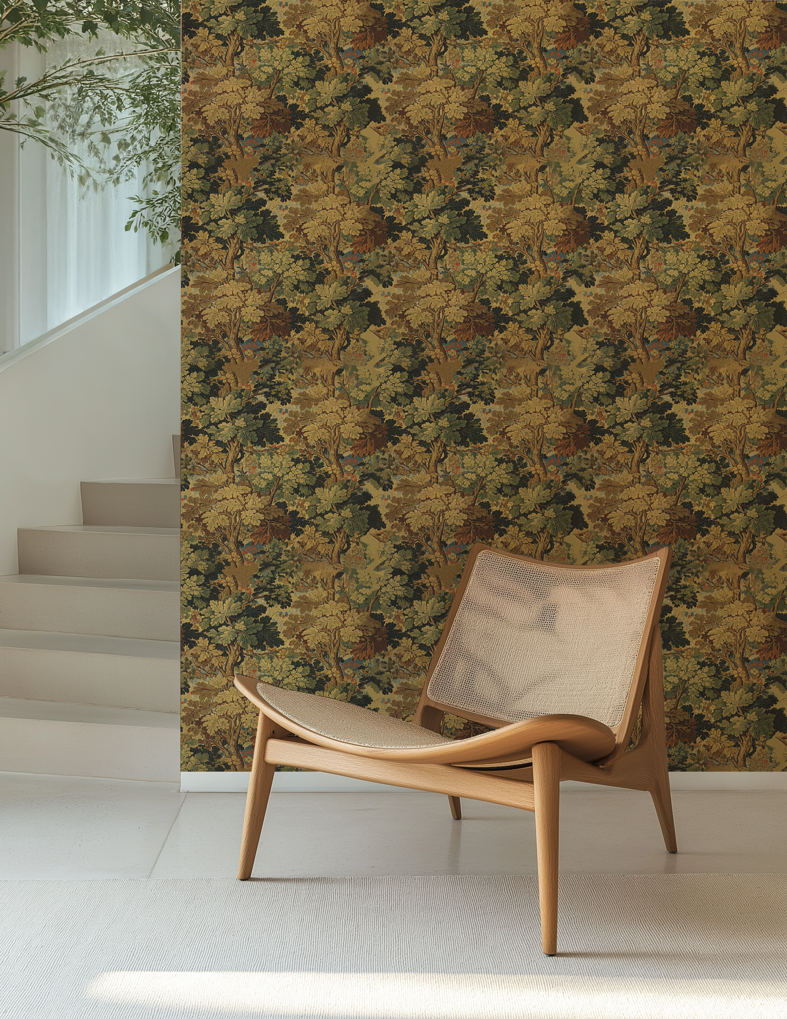 Antique woodland leaf wallpaper shown on a full accent wall with a modern lounge chair.