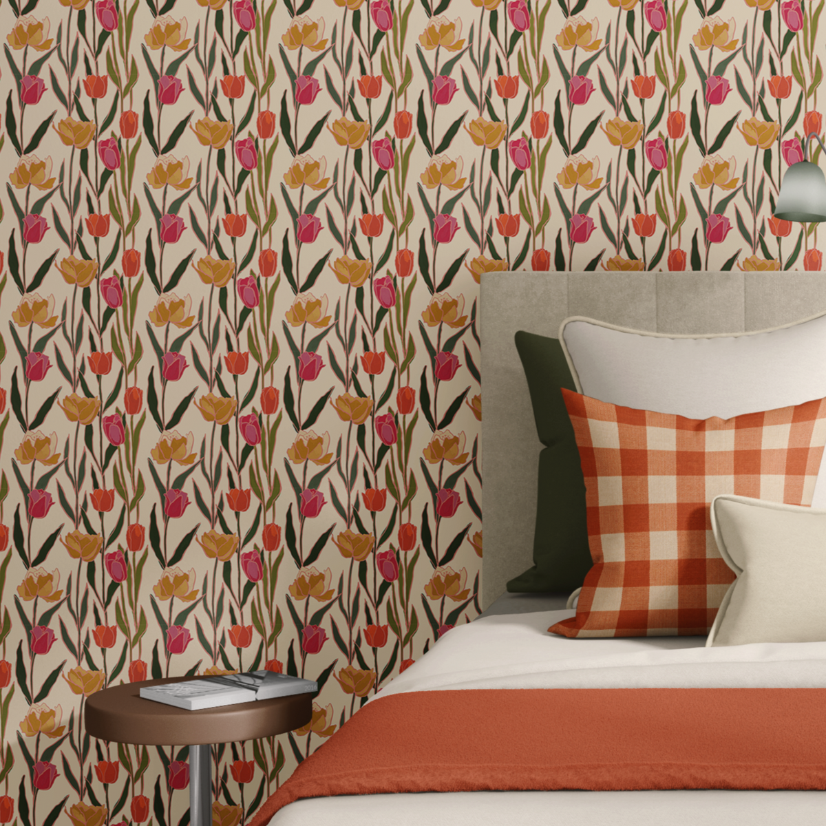Colorful tulip wallpaper in a cozy bedroom with orange gingham pillow, olive green accents and warm neutral bedding
