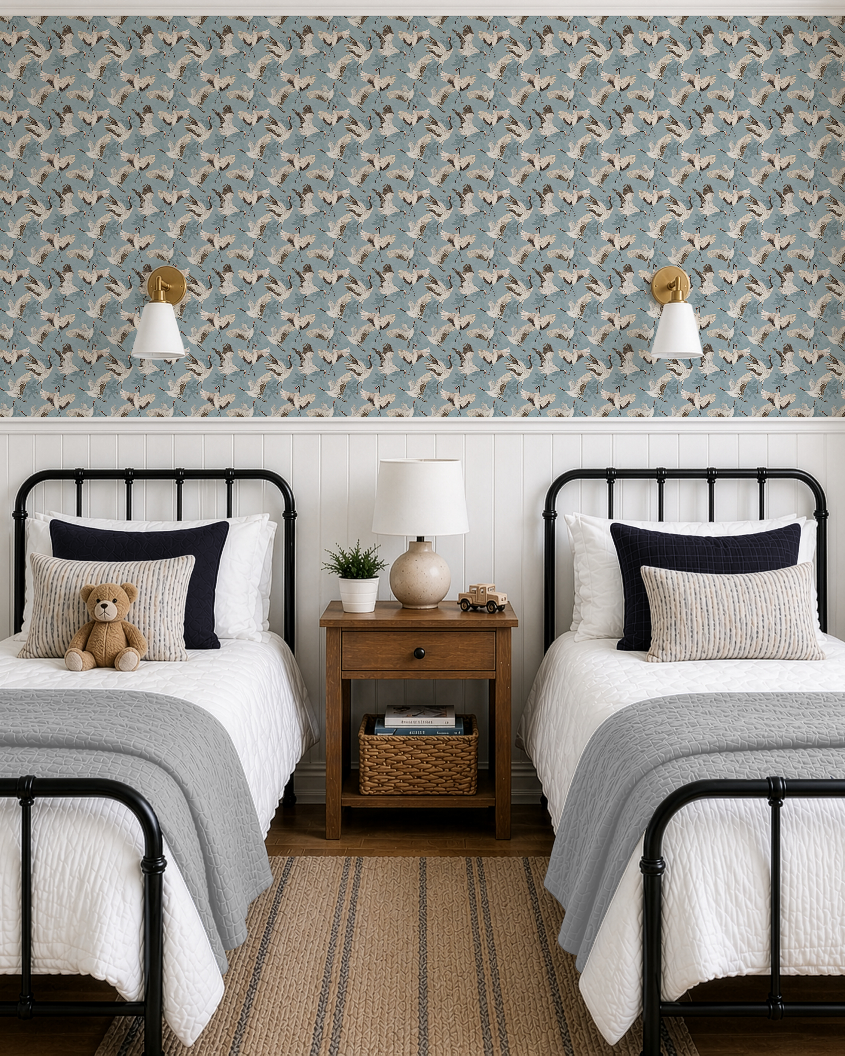 Tsuru Sky wallpaper in a shared bedroom with twin beds and an intricate repeating crane pattern on a dusty blue background.