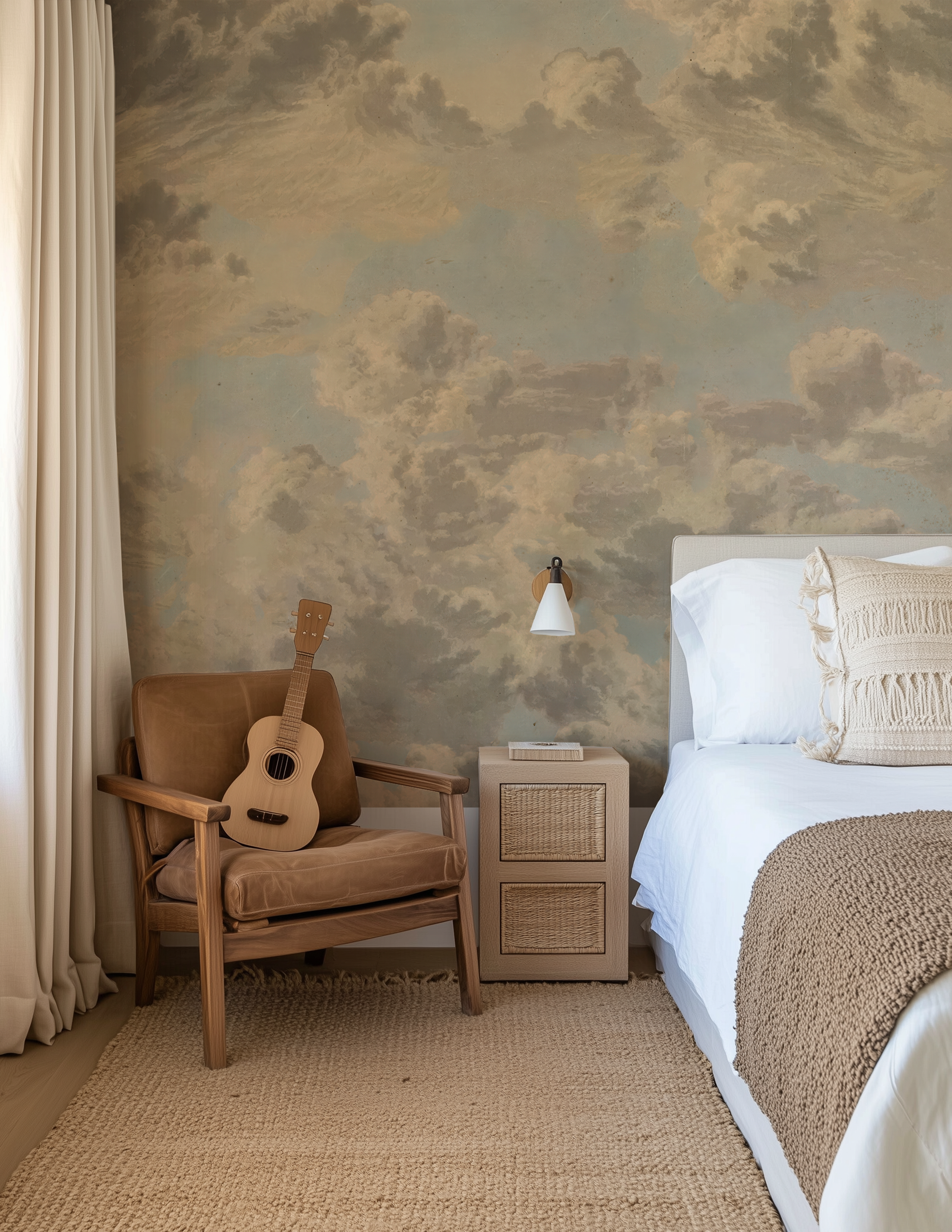 Antique sky wallpaper mural installed behind a bed with warm neutral furnishings