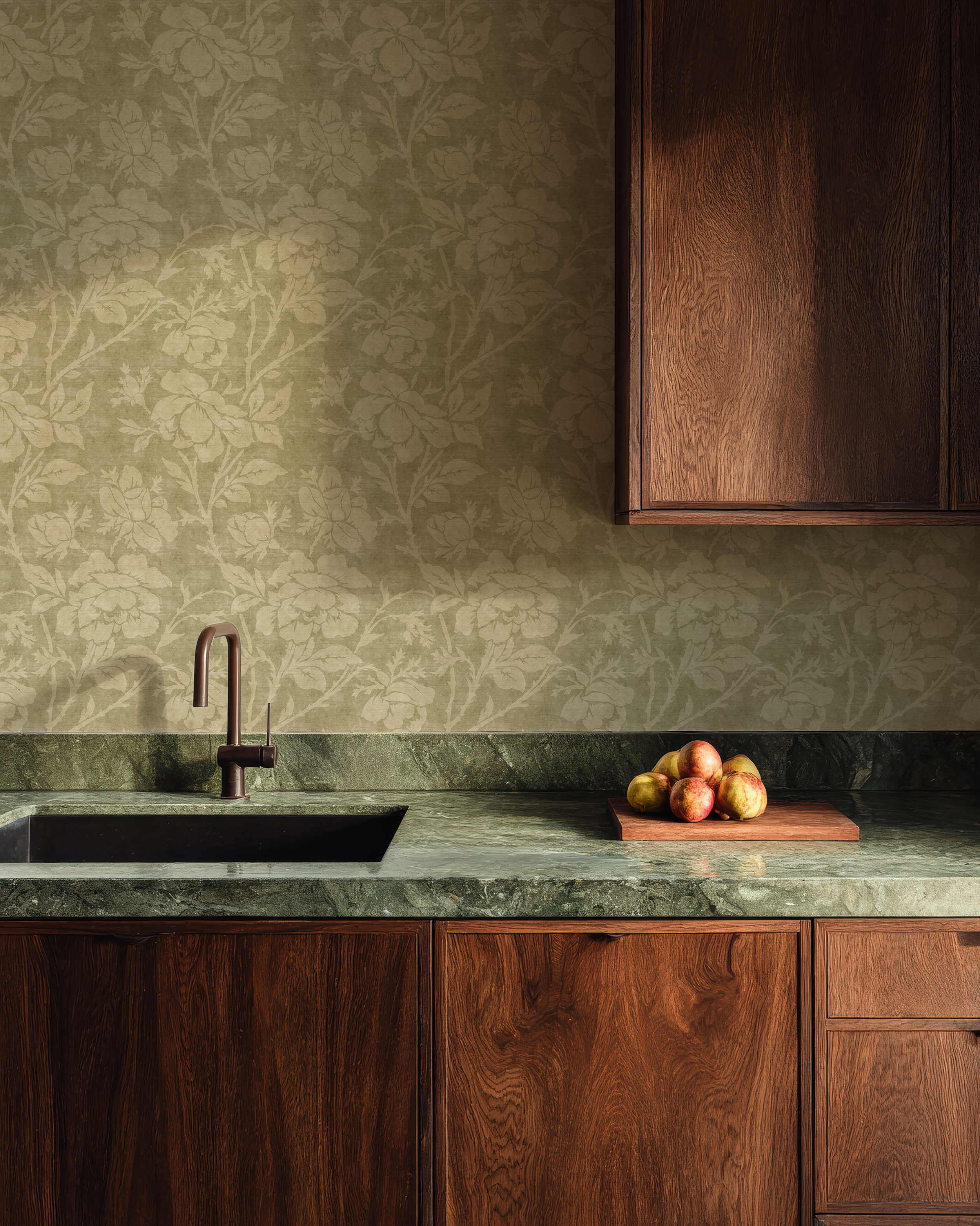 Sage green peel and stick wallpaper with woven rose pattern installed in a kitchen with dark wood cabinetry