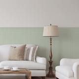 Green bobbin wall panel decals in a cozy modern living room