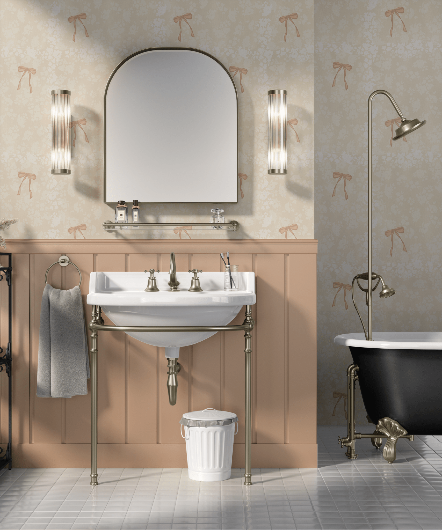Bathroom featuring a wall-mounted sink with brass supports, a large arched mirror flanked by vertical light sconces, and a classic black clawfoot bathtub, set against a wall adorned with cream wallpaper featuring a subtle floral pattern and bows