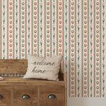 Cozy entryway decorated with Cactus Trail wallpaper featuring a cactus and horseshoe pattern
