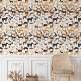 interior corner with a rattan chair and two wicker baskets beside it. The wall is covered with wallpaper featuring a variety of colorful dog illustrations.