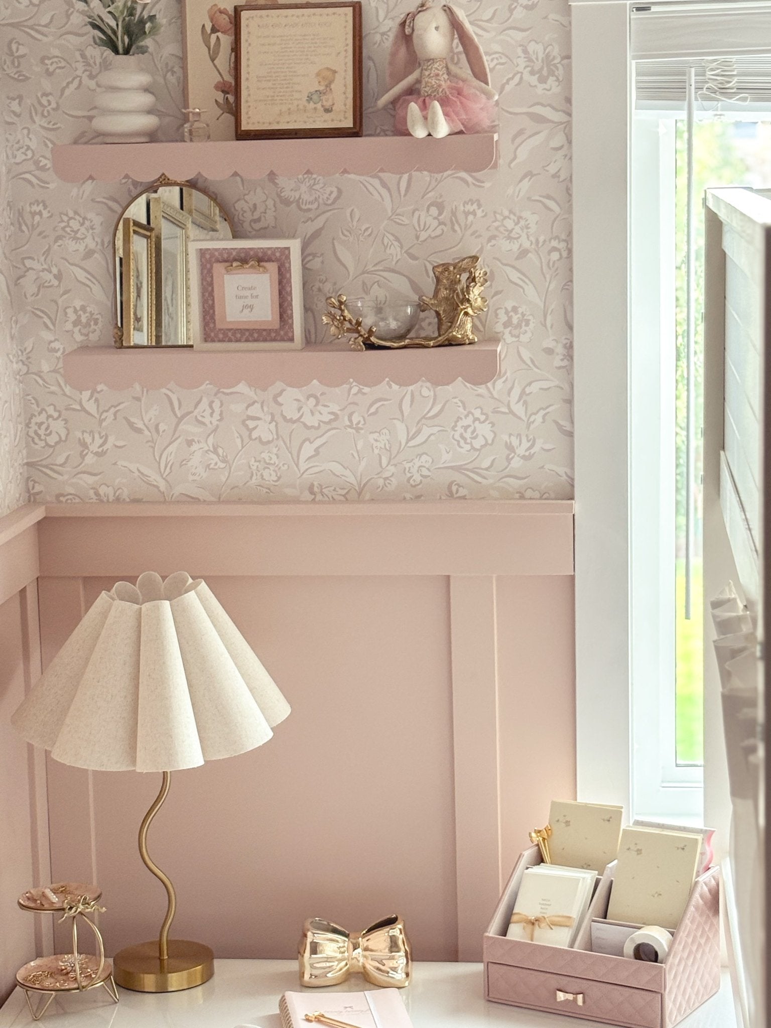 pink wainscotting and wallpaper