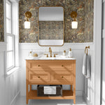 A bathroom wall covered in a floral and butterfly wallpaper, featuring an elegant mix of flowers and butterflies in soft colors on a neutral background, creating a serene and whimsical atmosphere.