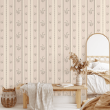 Cottagecore-style wallpaper with floral stripes in a romantic bedroom
