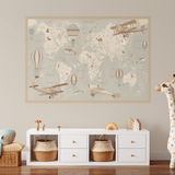 A cozy children's room with a soft toy giraffe, storage baskets, and a large removable world map wall decal adorned with vintage planes and hot air balloons. The decal serves as both decor and an educational feature for kids.