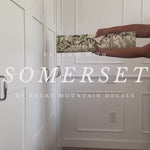 Unrolling Somerset peel and stick removable vintage wallpaper