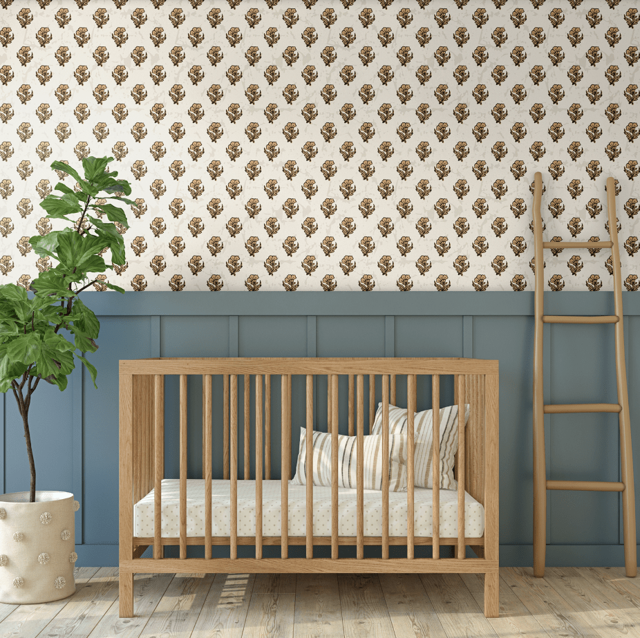 Nursery design with floral wallpaper and wooden crib.