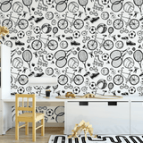 Playroom featuring retro sports-themed wallpaper with desk and decor.