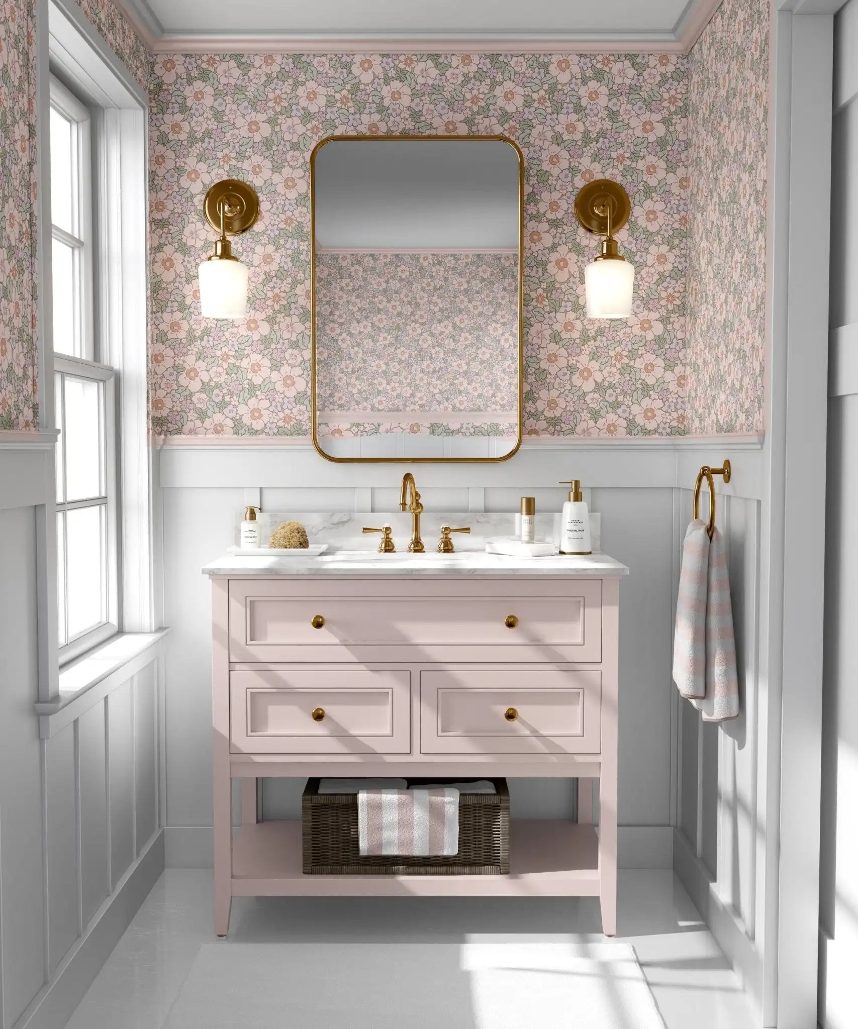 Vintage floral wallpaper in pink bathroom with blush vanity, gold fixtures, and wainscoting for an elegant botanical touch