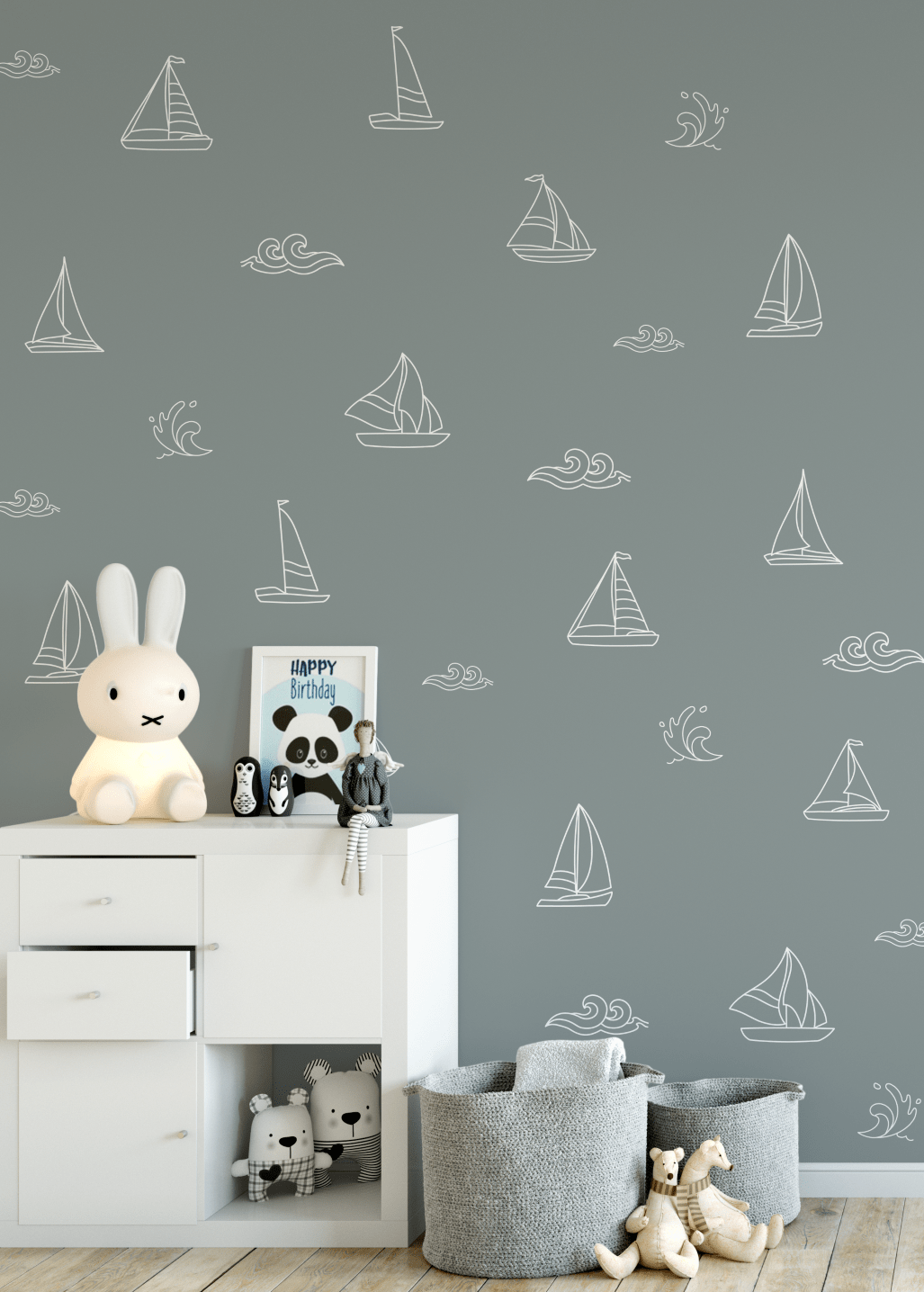 Nautical kids room with white outline decals on a dark blue wall and modern decor