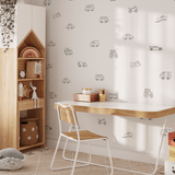 Study room featuring customizable vehicle wall decals, including cars, helicopters, and trucks, creating a playful and functional space