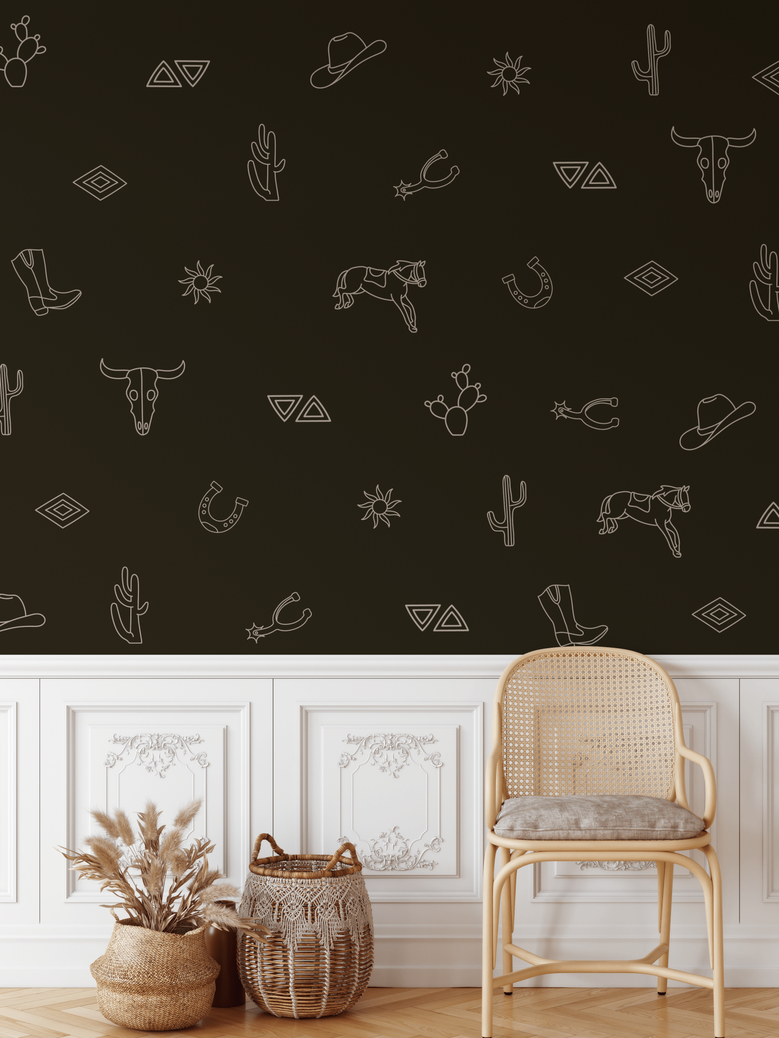 Dark western-style room with white outline decals of cowboy elements like horseshoes, hats, cacti, and spurs