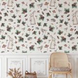 Storybook-themed wallpaper with whimsical bunny and blackberry design displayed in a rustic living room with natural decor.