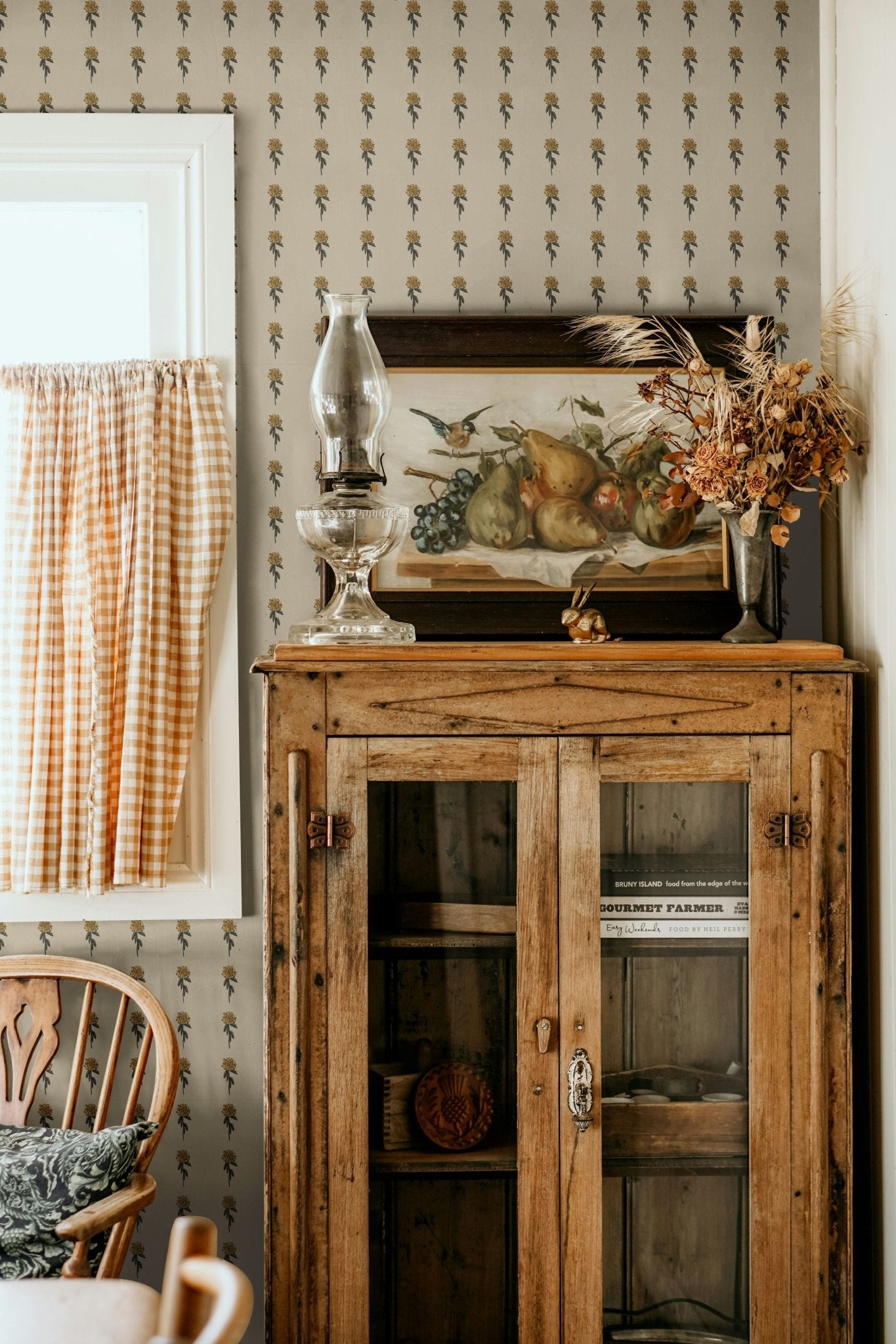 Rustic kitchen wall with Vintage Aster Wallpaper and vintage decor accents