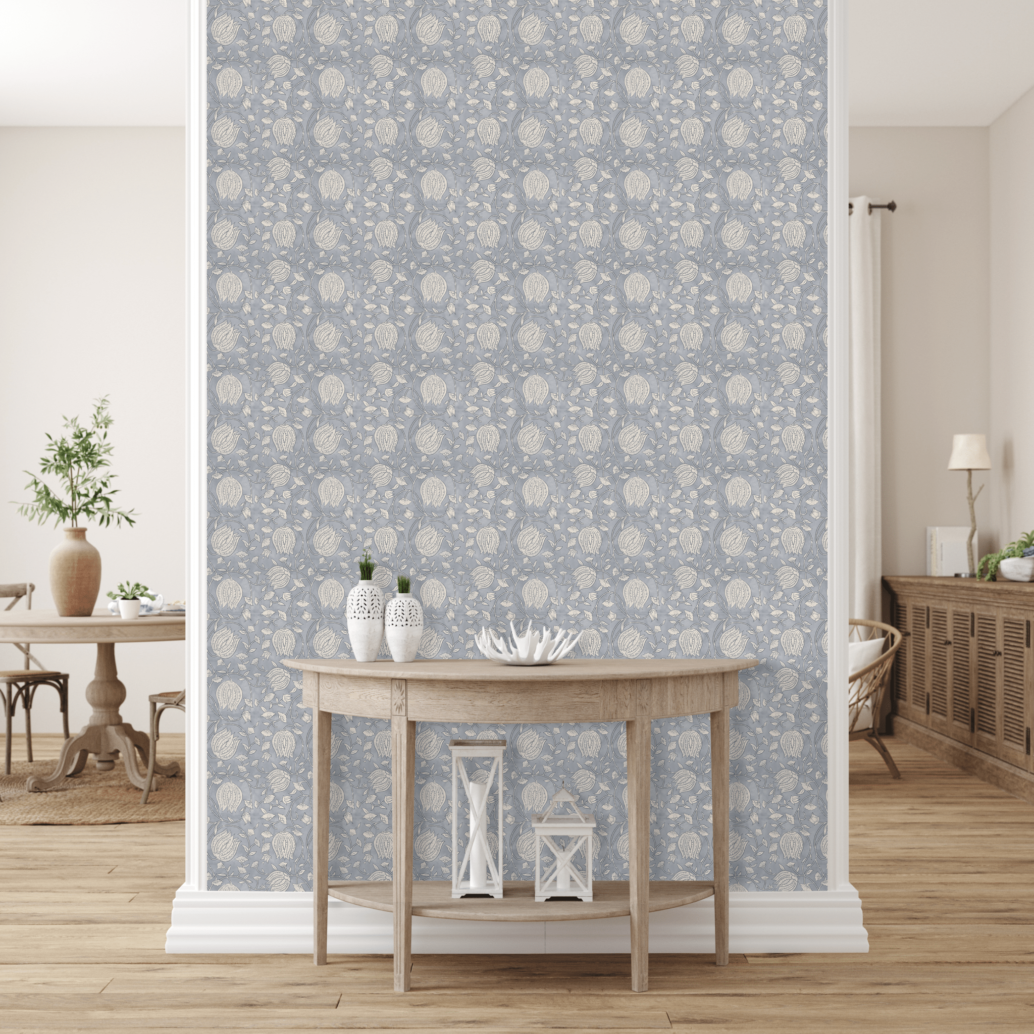  chic room with a wall featuring blue lotus pattern peel and stick removable wallpaper. A wooden console table with decorative lanterns and a coral ornament enhances the space. In the background, a plant and a sideboard blend seamlessly