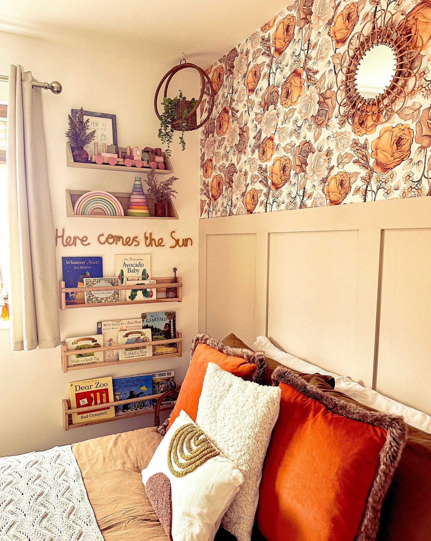 Bohemian styled bedroom featuring floral wallpaper