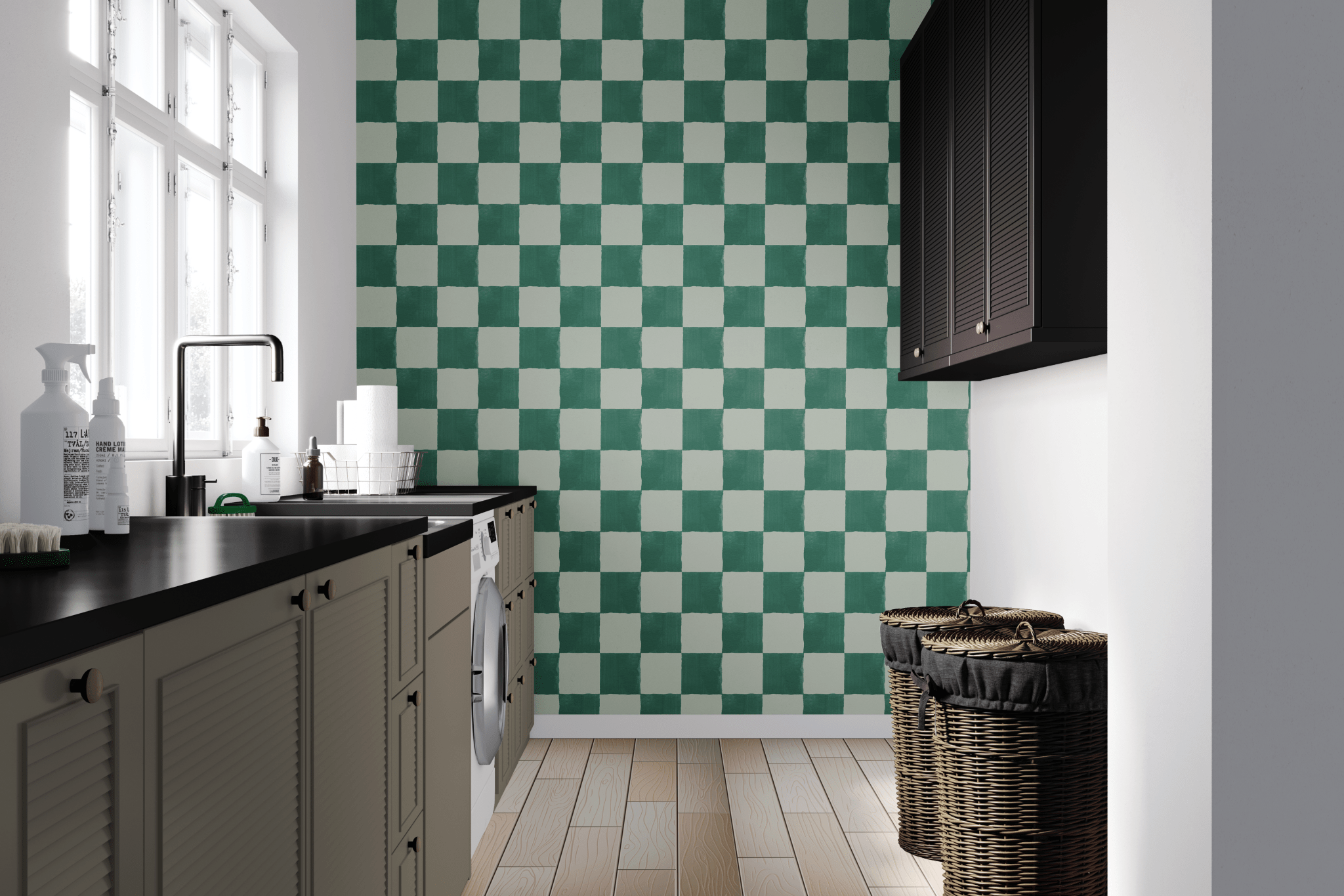 Spacious kitchen interior with checkerboard green and white wallpaper, black countertops, white cabinets, and woven laundry baskets