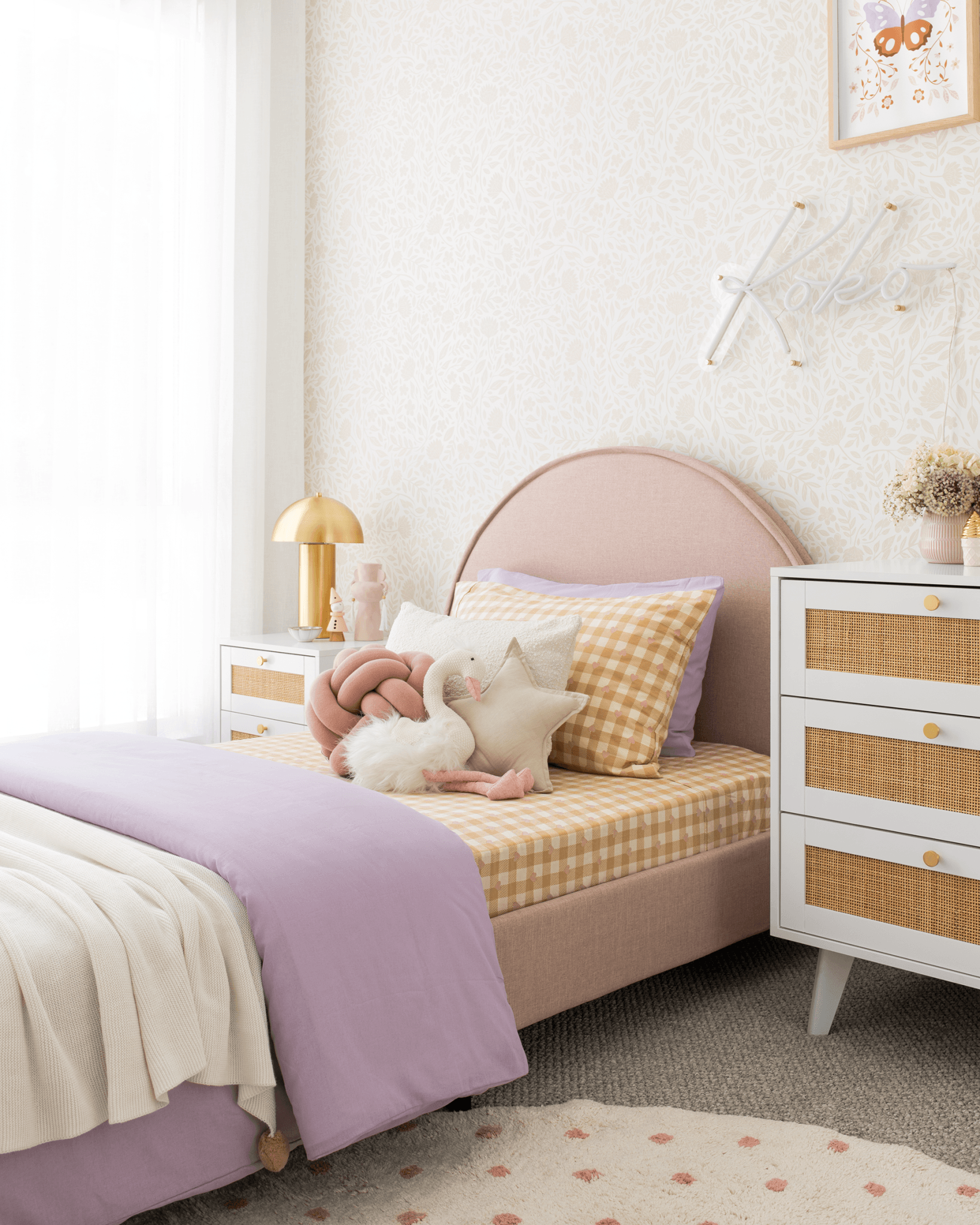 Pretty girls room with beige floral wallpaper