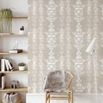 Boho style living room featuring earth toned cream and white self adhesive wallpaper