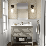 Bathroom featuring golden floral peel and stick wallpaper with elegant white wainscoting and a classic vanity.