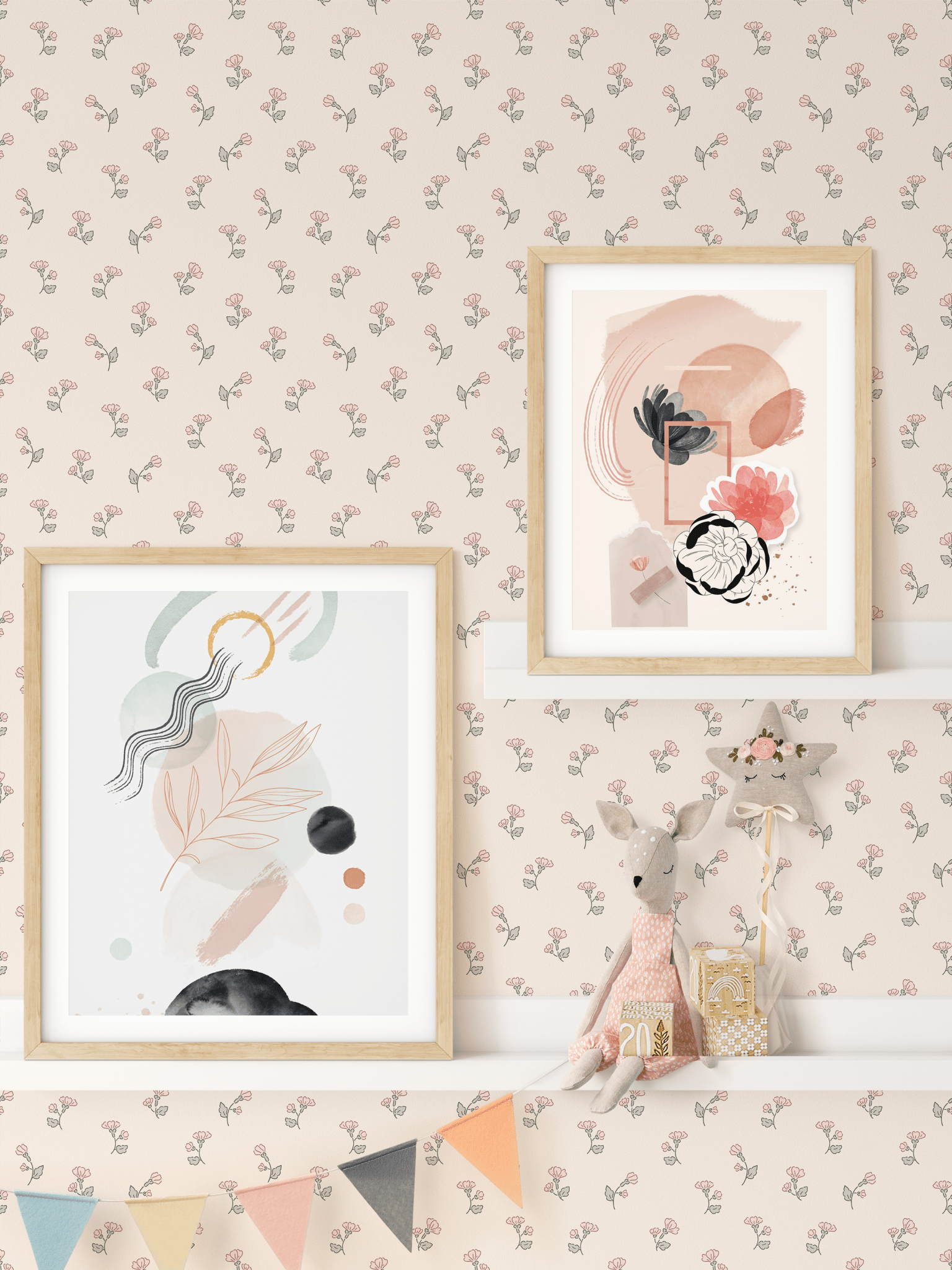 Pink floral wallpaper in a child's room with art, toys, and decorative garland.