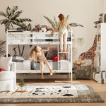 Safari Animal zebra, giraffe, elephant wall decor in a room with white bunk beds