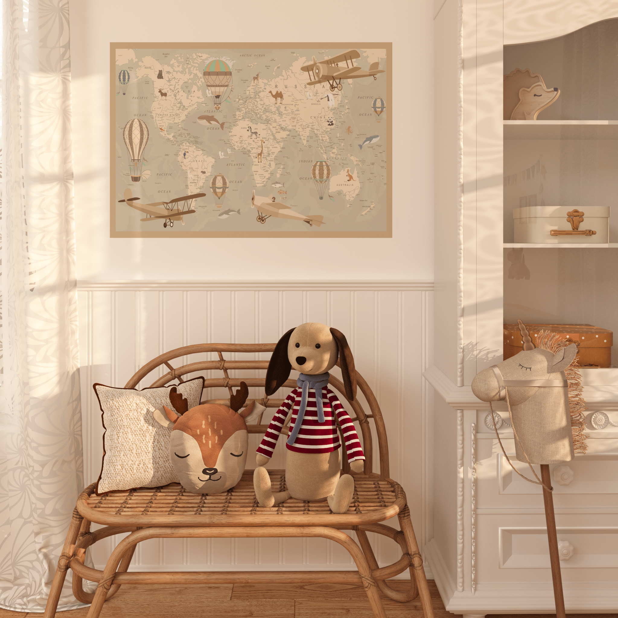 A child's room with a removable wall decal of a world map featuring whimsical hot air balloons and planes above a bench with a plush dog and deer cushion